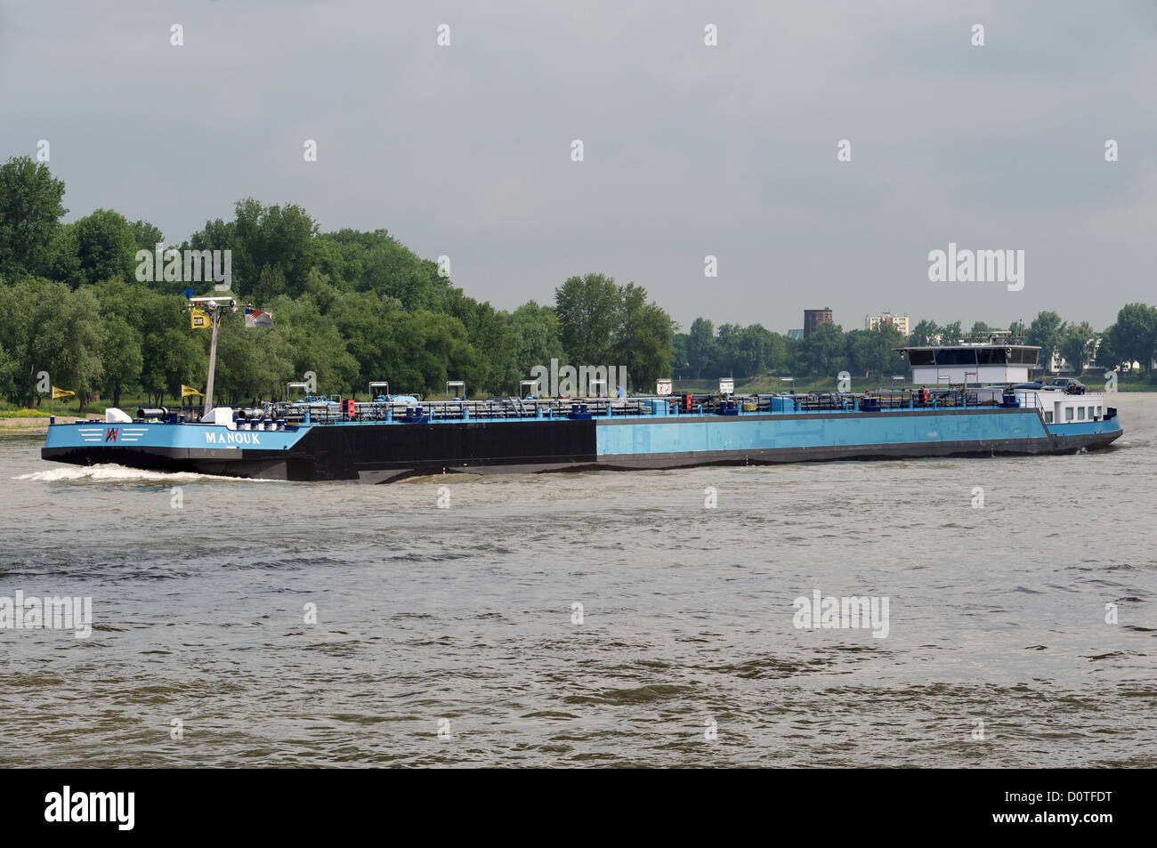 Commercial barge 'Manouk' river Rhine, Cologne, Germany. Stock Photo