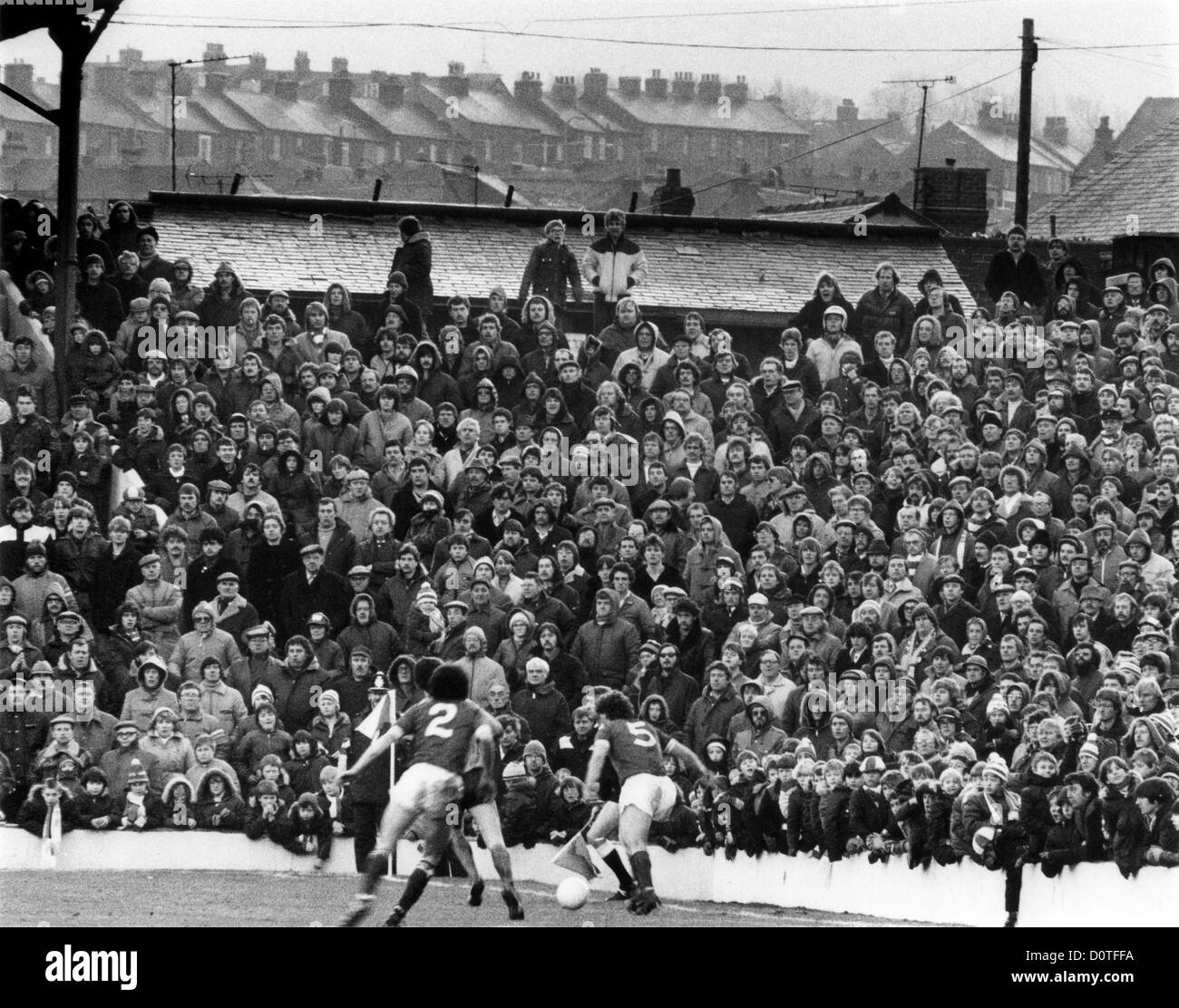 Football crowd watching Barnsley v Wolverhampton Wanderers at Oakwell 5th February 1983 PICTURE BY DAVID BAGNALL. crowds spectators fans supporters Britain 1980s football match game Stock Photo