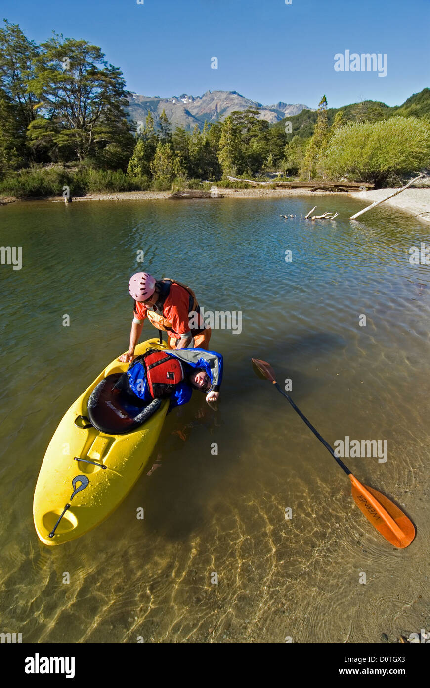 Kayak roll instruction on Chile's Rio Epsolon. Stock Photo