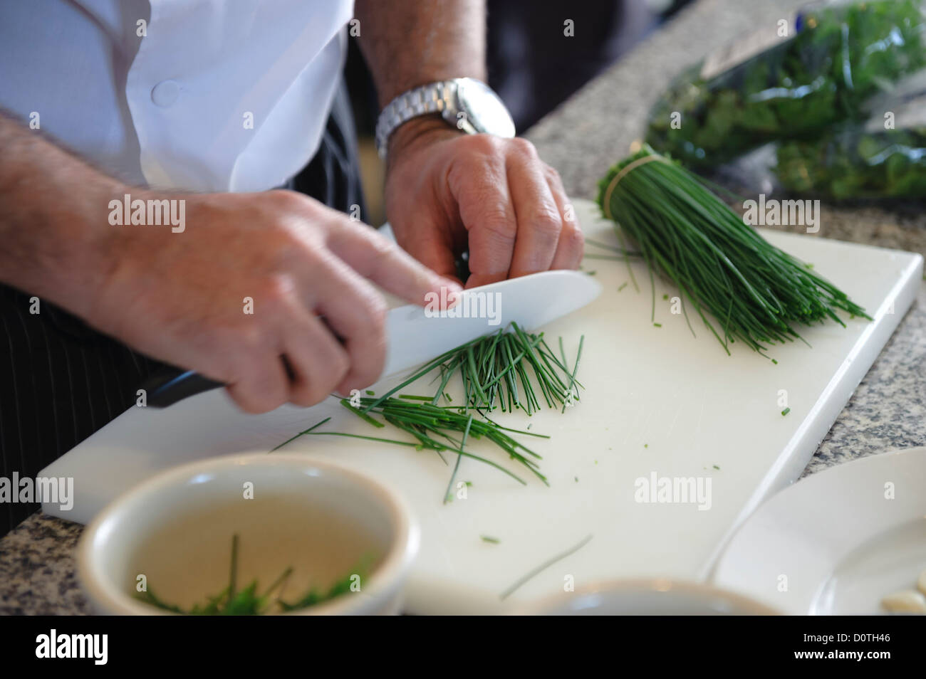 Cook Using Knife Detail hands chef using hi-res stock photography and images - Alamy