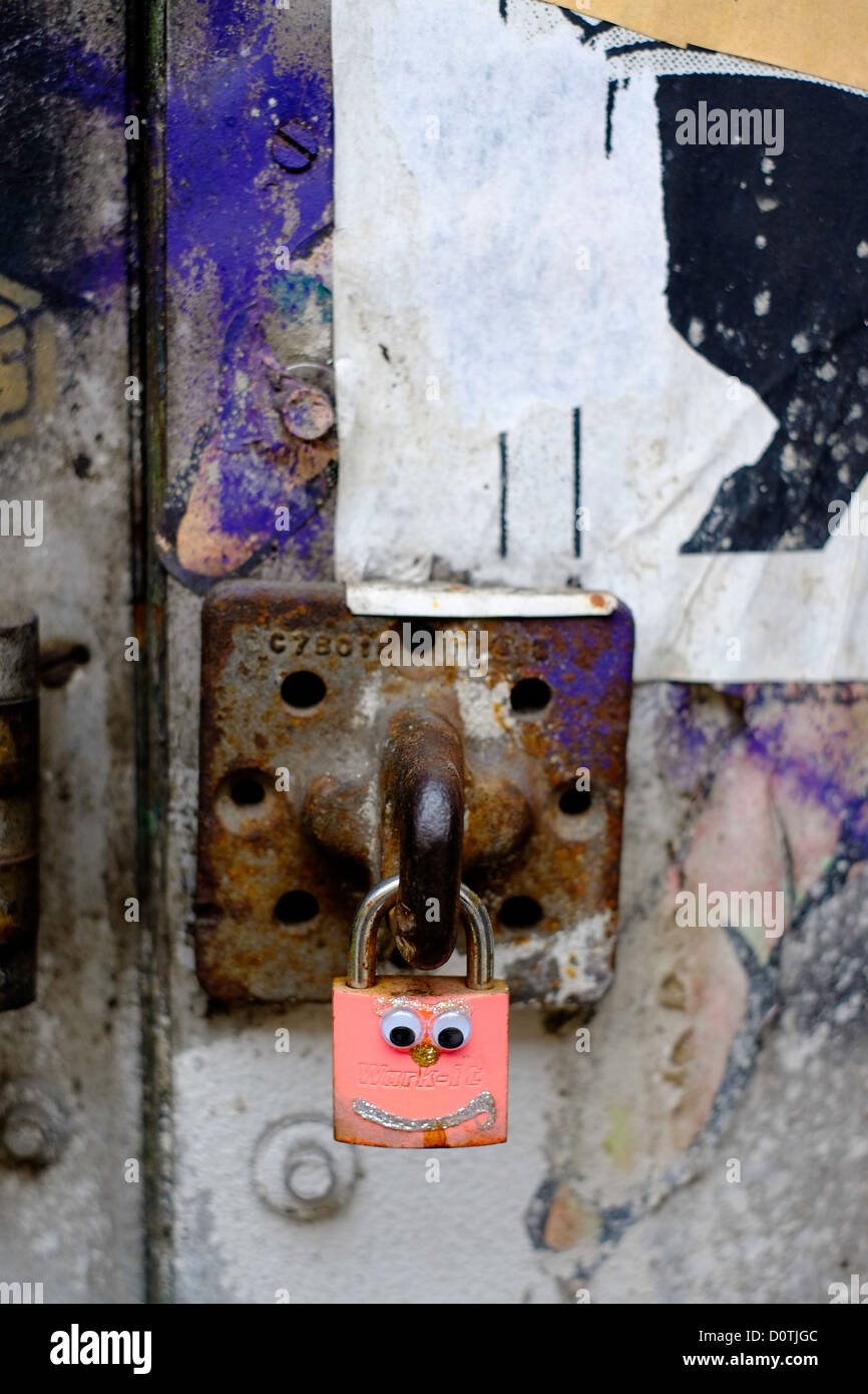 Padlock with a face creatively painted onto Stock Photo Alamy