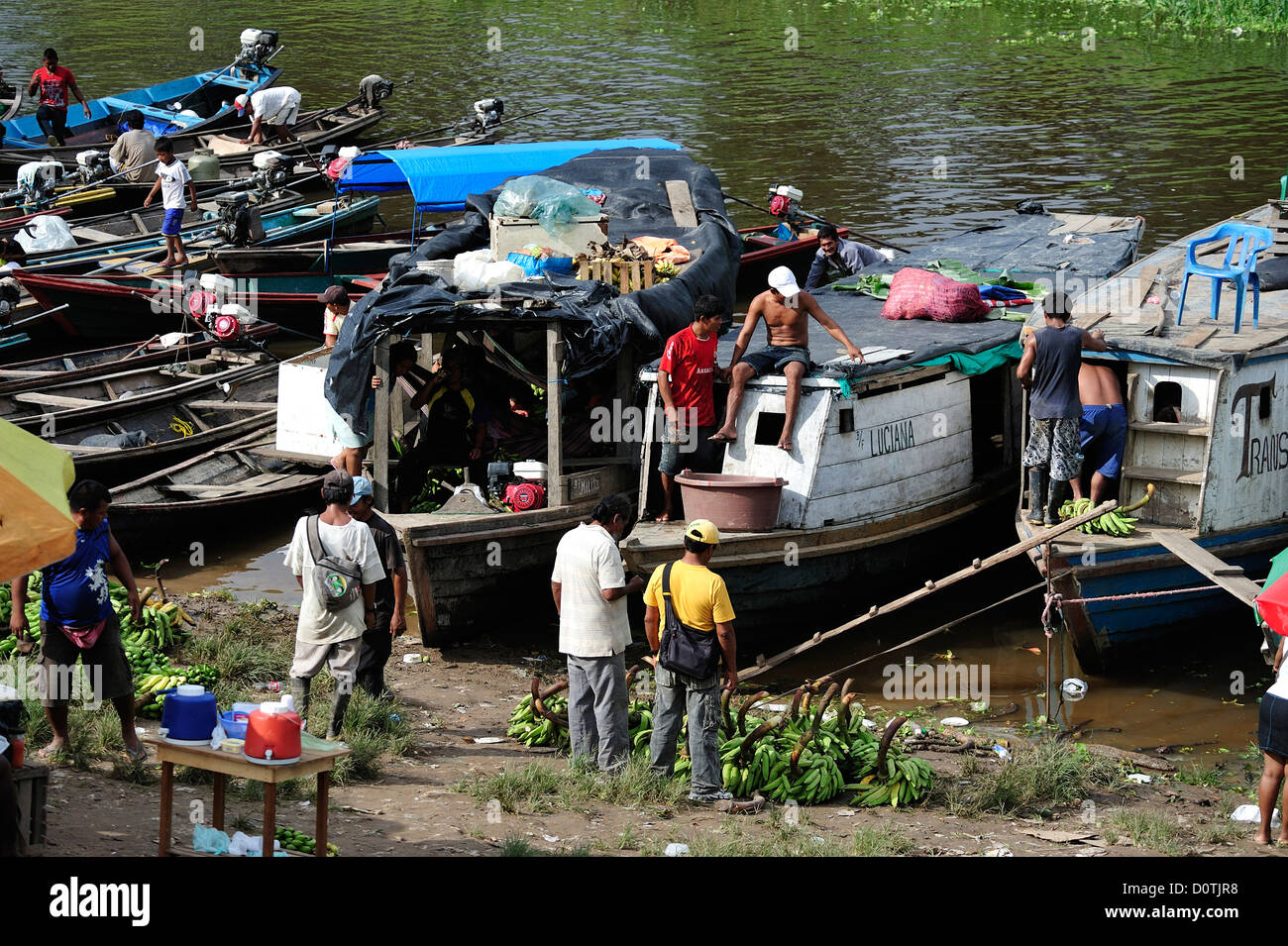 Loading, bananas, docks, boats, waterfront, Amazonas, Leticia, Colombia, South America Stock Photo