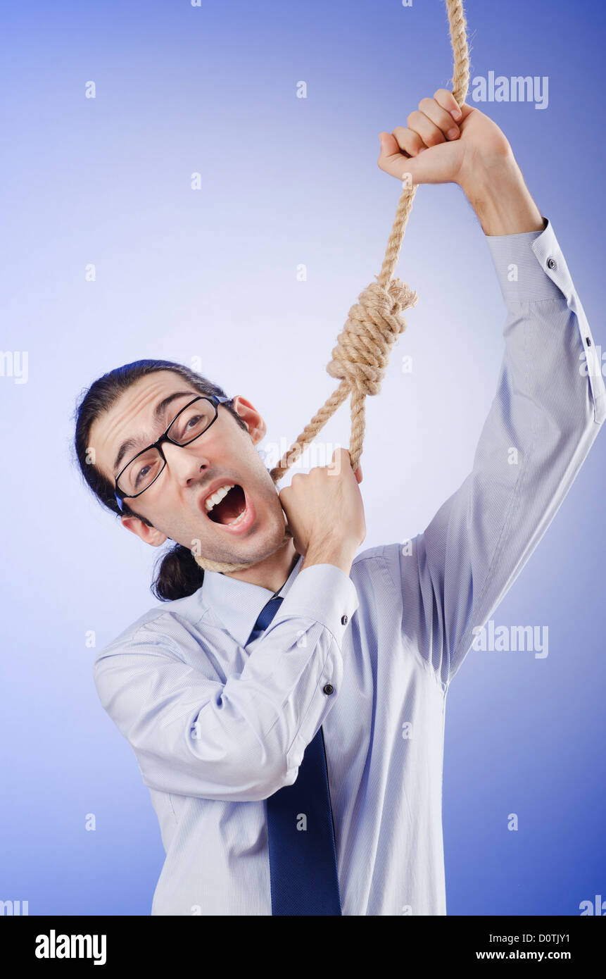 Businessman committing suicide through hanging Stock Photo - Alamy