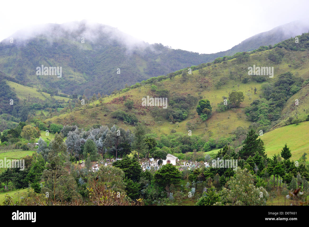 Cemetery, hill, landscape, andes, storm, stormy, lush, mountains, Totoro, Navado de Huilo, Colombia, South America Stock Photo