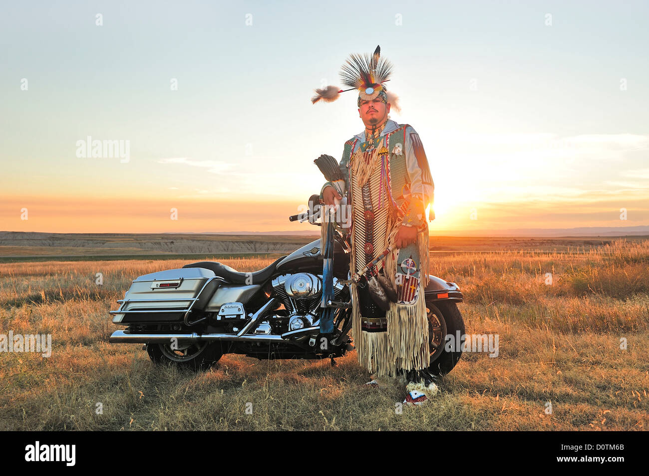 Sioux, Badlands, Stephen Yellowhawk, bike, badland, warriors, feathers, regalia, American Native, Lakota, South Dakota, USA, Uni Stock Photo