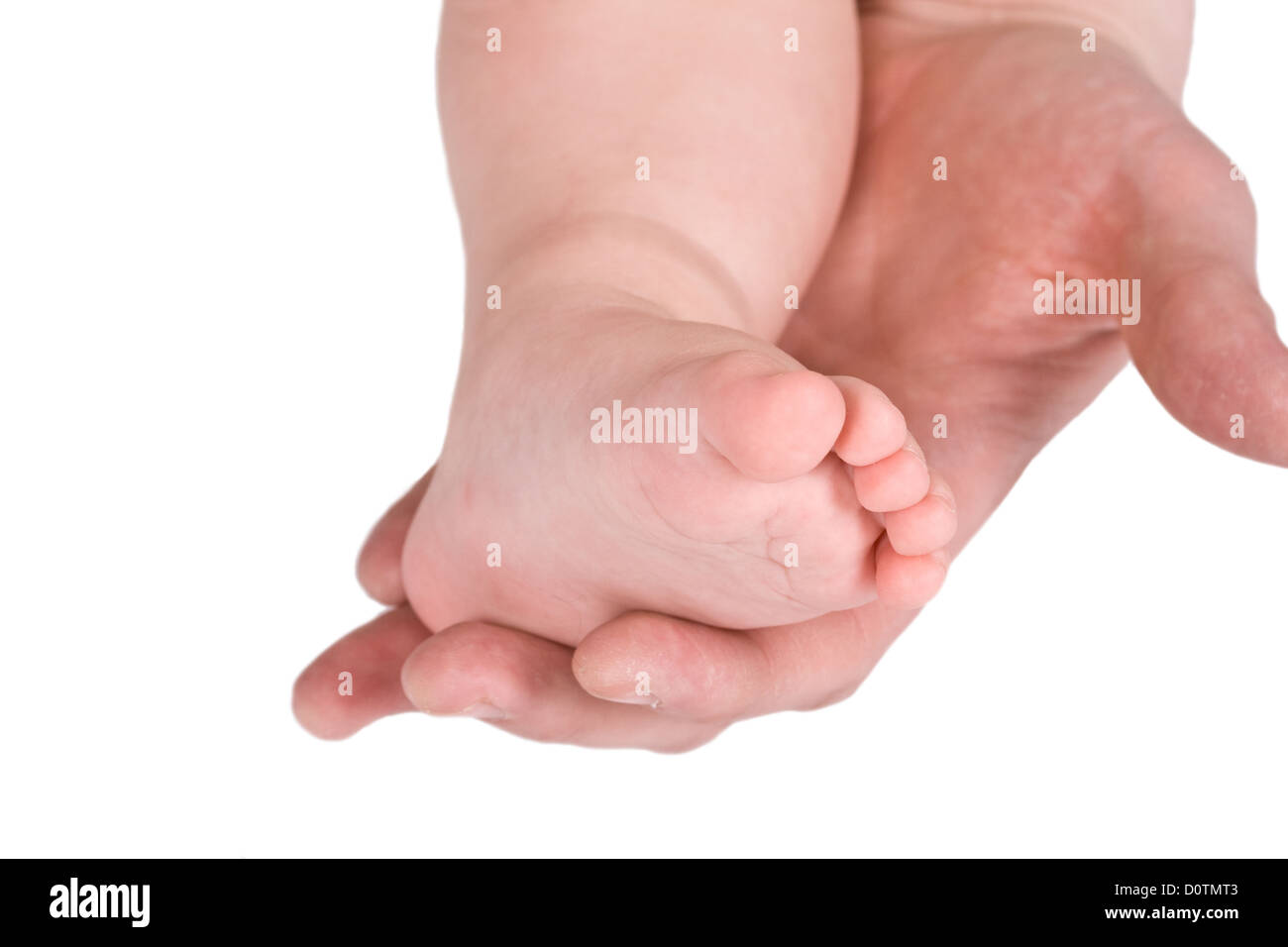 Children foot and adult hand Stock Photo - Alamy