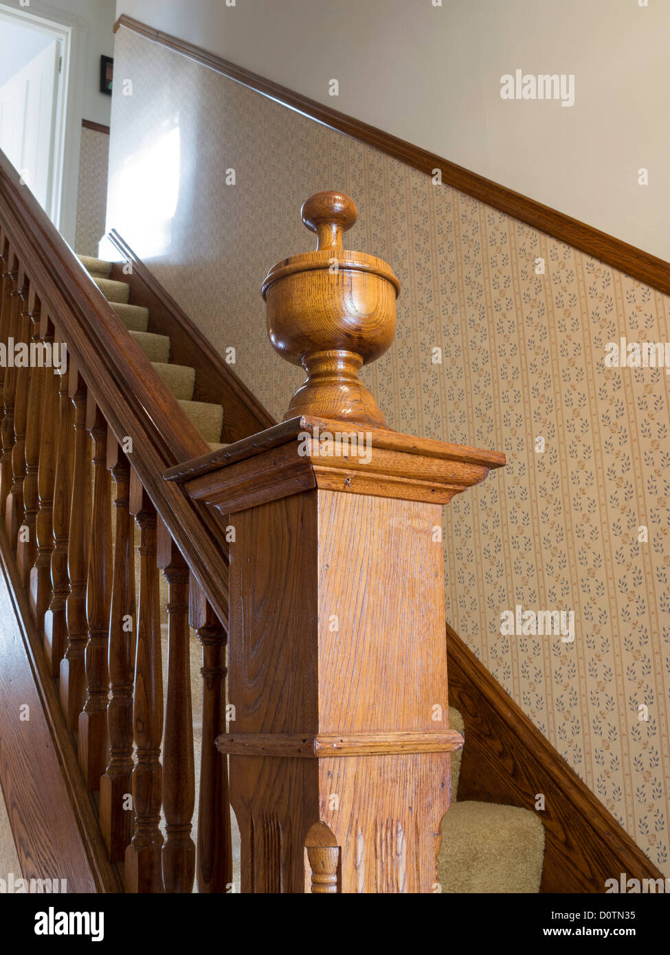 Decorative Finial on Newel Post ,Balustrade and Staircase, Residential House Stock Photo