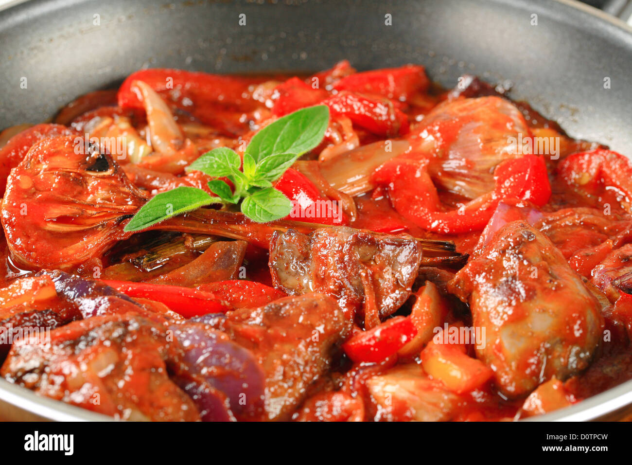 Preparing chicken liver stir fry Stock Photo Alamy