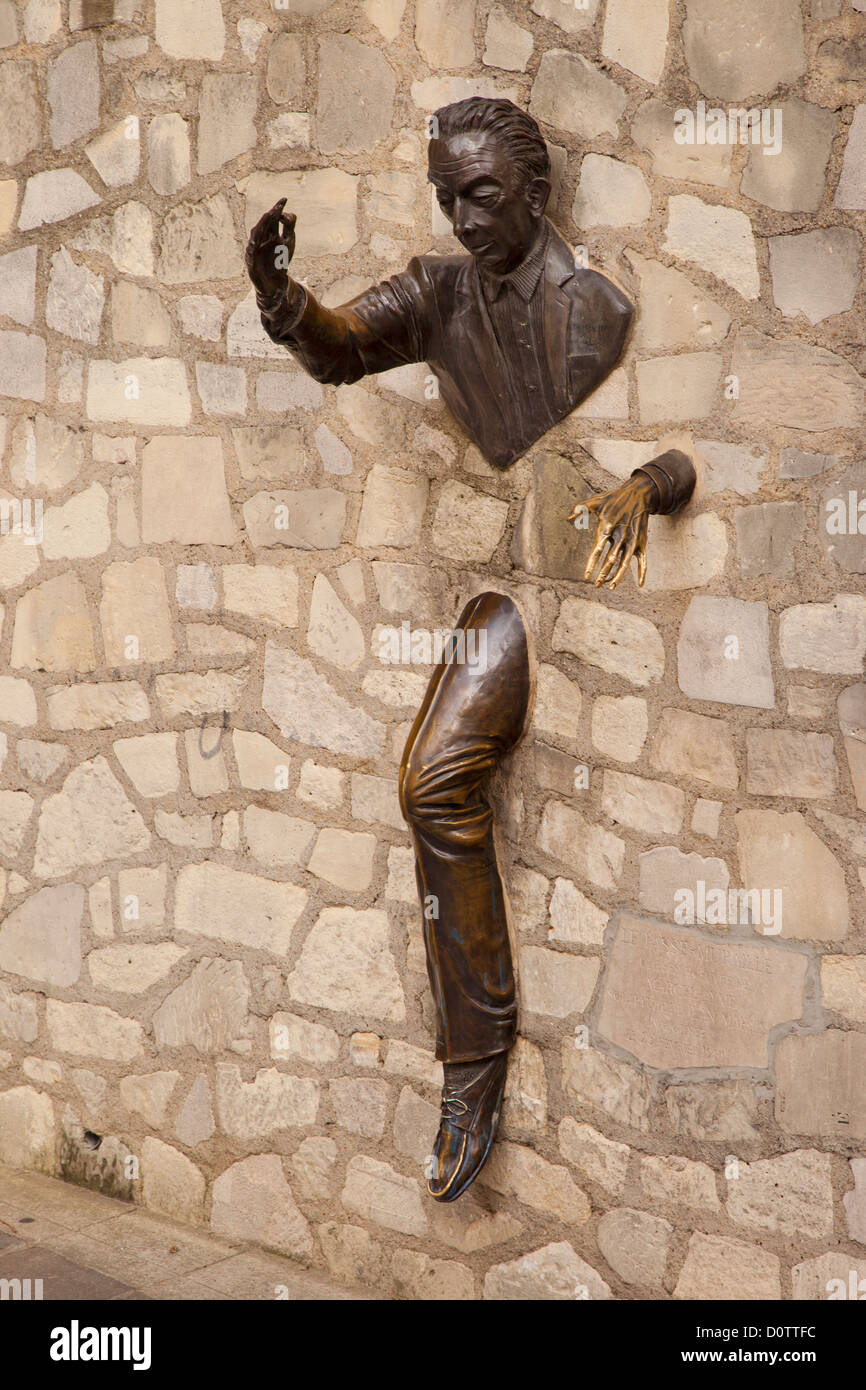 Jean Marais' Statue of Marcel Ayme based on Ayme's story 'The Walker Through Walls,' Montmartre, Paris France Stock Photo