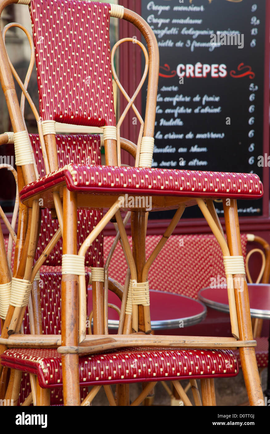 Stacked Cafe tables at outdoor Cafe in Montmartre, Paris France Stock Photo