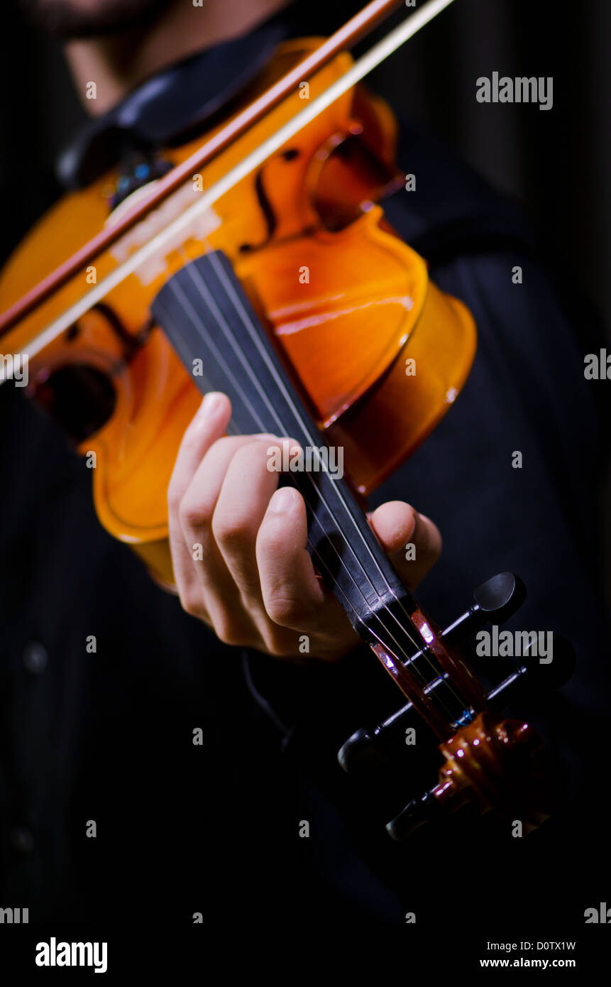 Young violin player playing Stock Photo Alamy