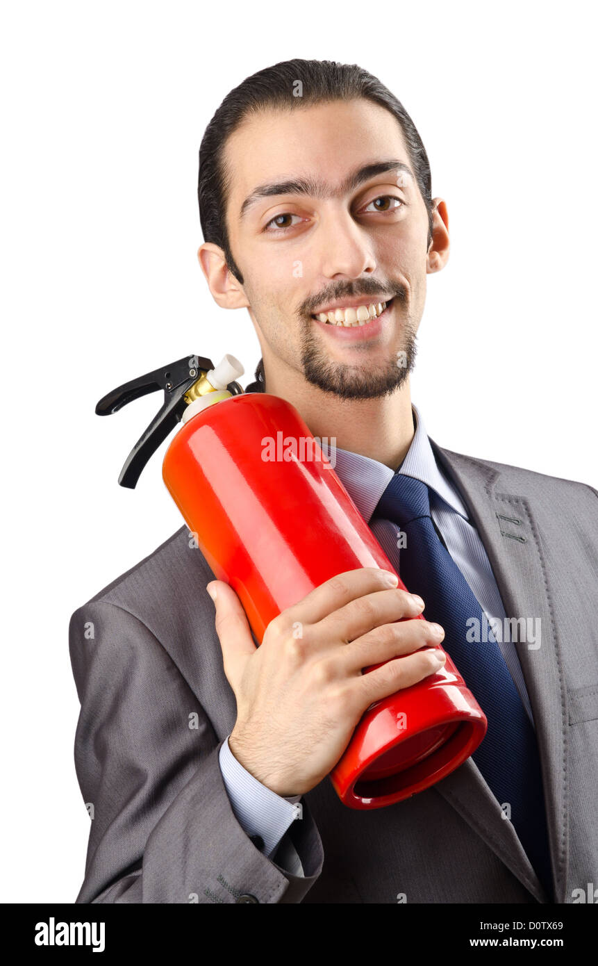 Man with fire extinguisher in firefighting concept Stock Photo Alamy