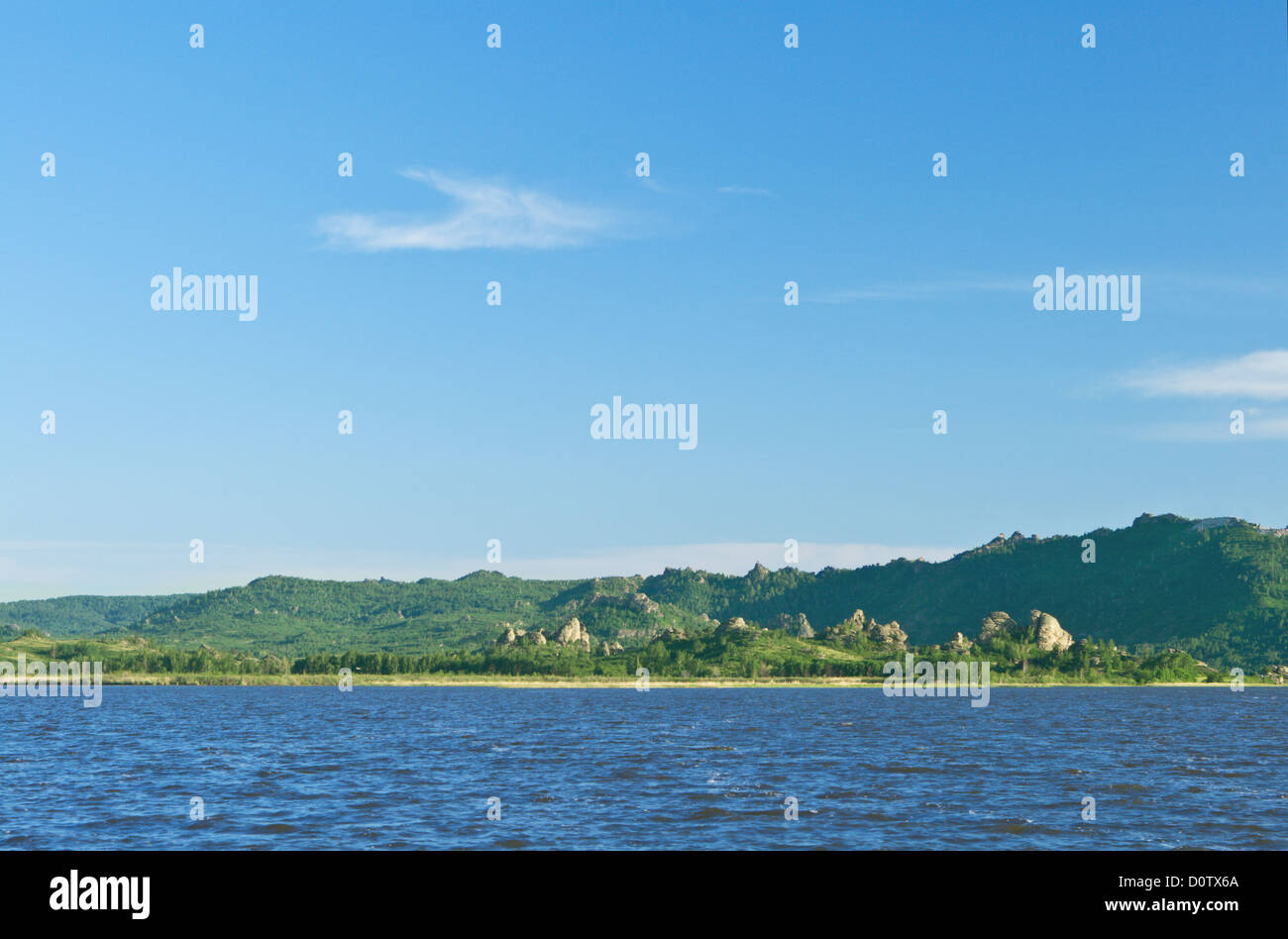The blue sky is reflected in lake Stock Photo - Alamy
