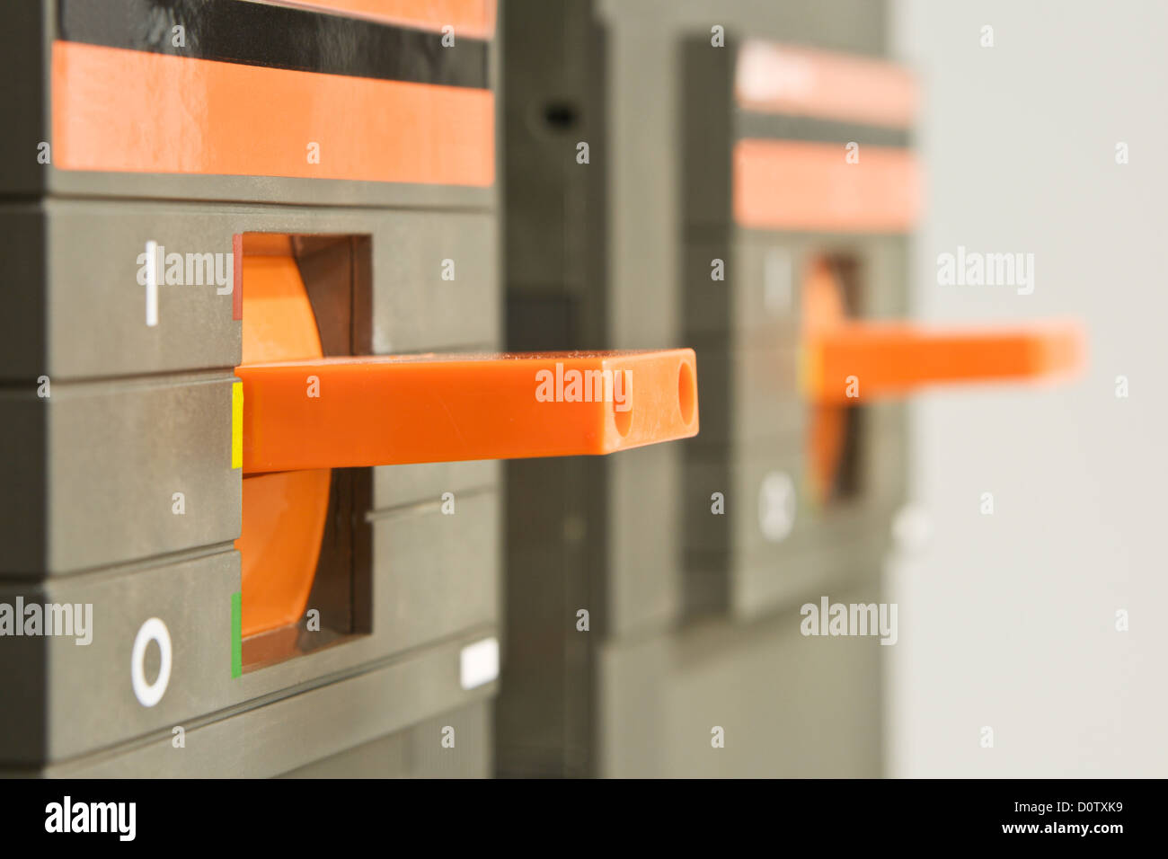 Orange circuit breaker on control panel Stock Photo Alamy