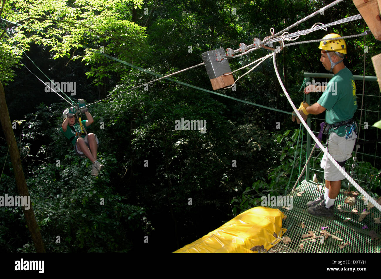 Young boy riding a zipline at Los Suenos Costa Rica Stock Photo Alamy
