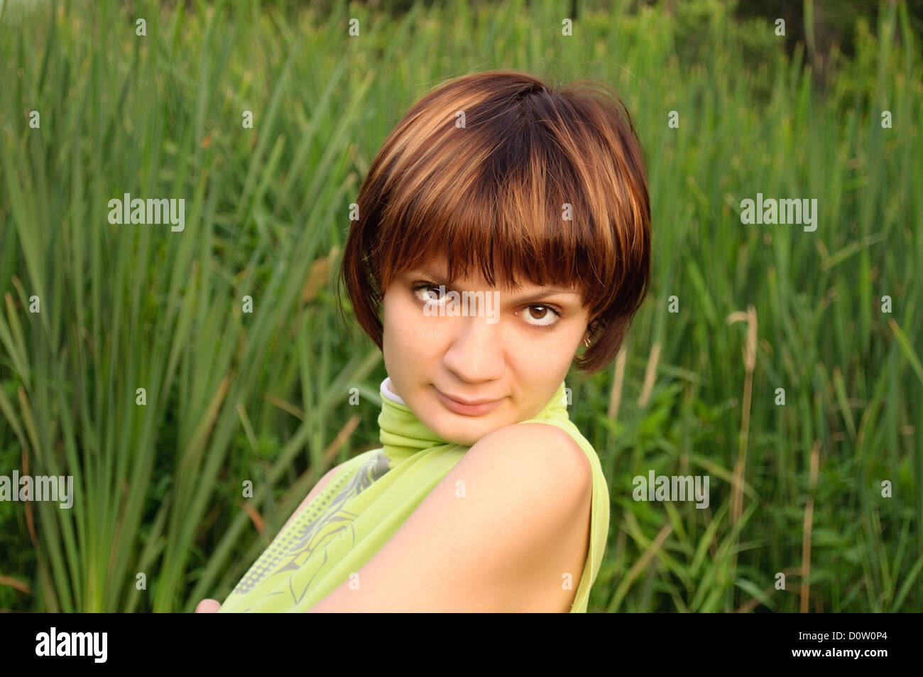 portrait of a beautiful young girl in park Stock Photo - Alamy