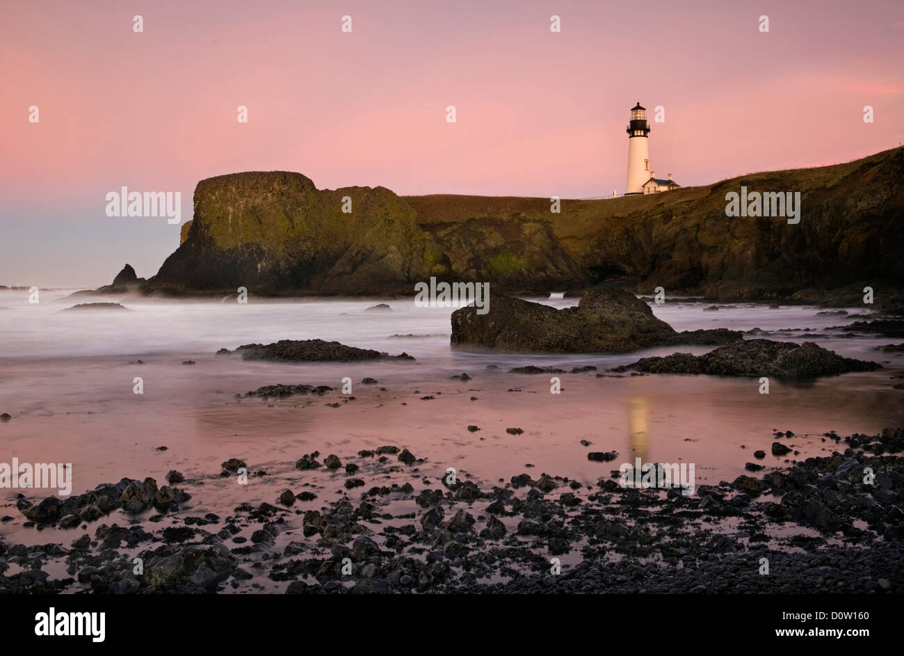 coast, coastal, sea, seaside, house, light, lighthouse, rocky, beach, shore, shoreline, horizontal, pink, red, magenta, color, s Stock Photo