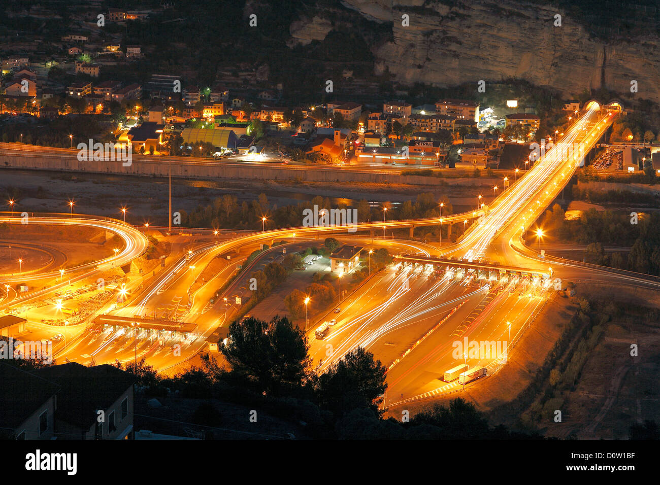 Italy, Europe, Liguria, Imperia, bridge, river, flow, Roia, Borgata, Roverino, toll place, at night, evening, highway Stock Photo