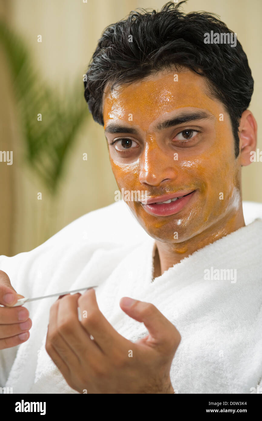Close up man peel off mask hi-res stock photography and images - Alamy