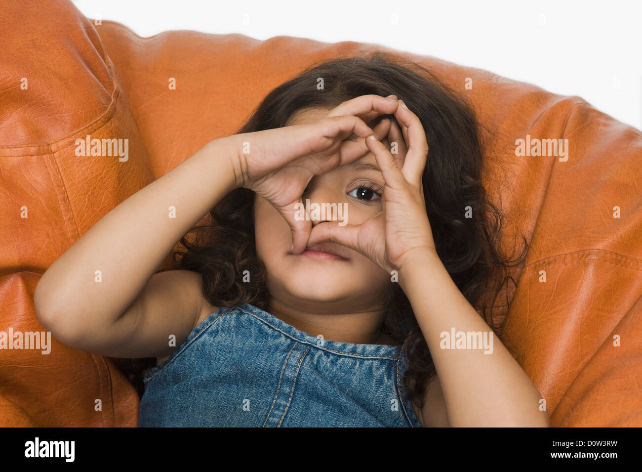 Girl relaxing on a bean bag Stock Photo - Alamy