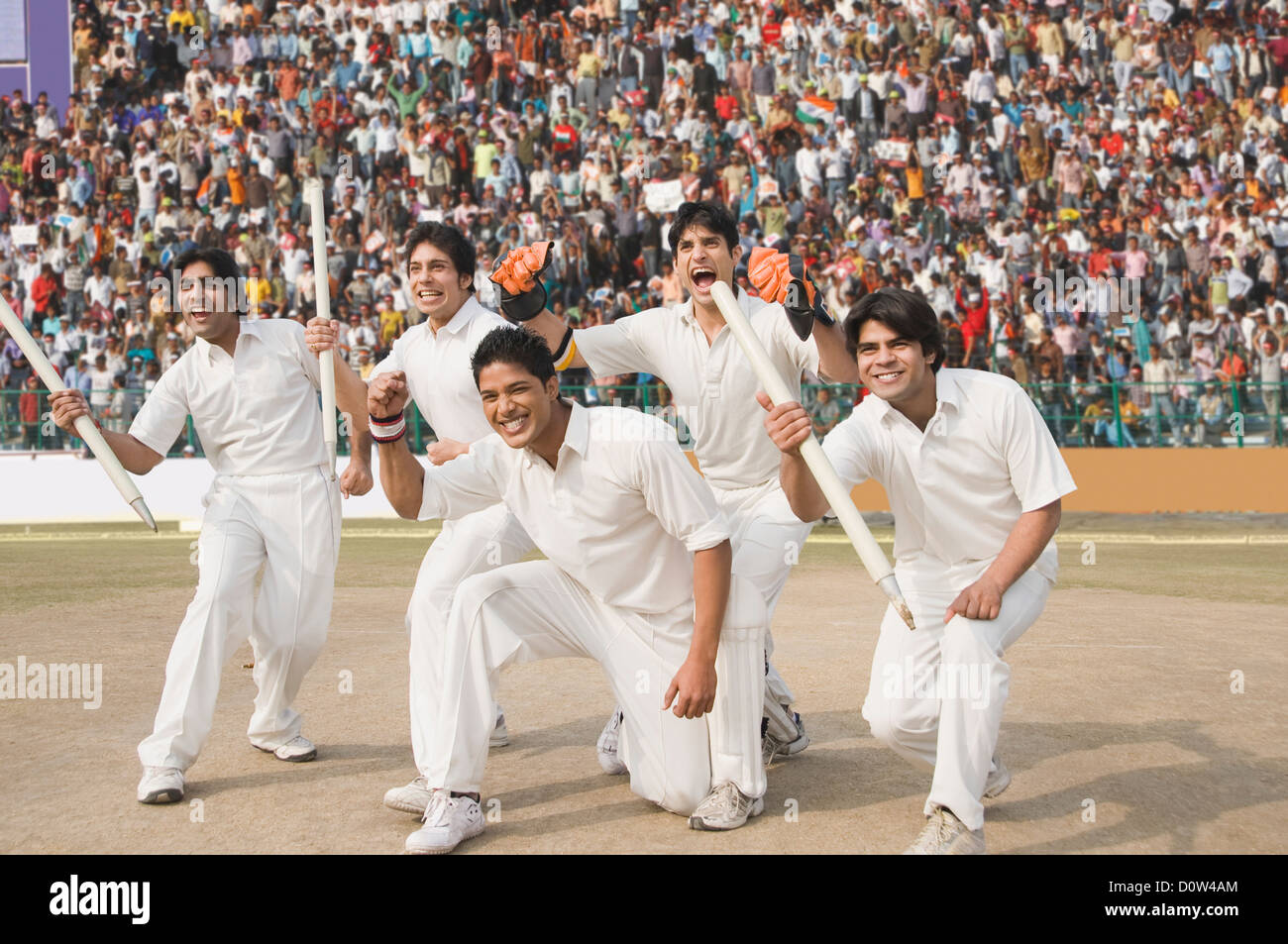 Cricket players celebrating their success Stock Photo