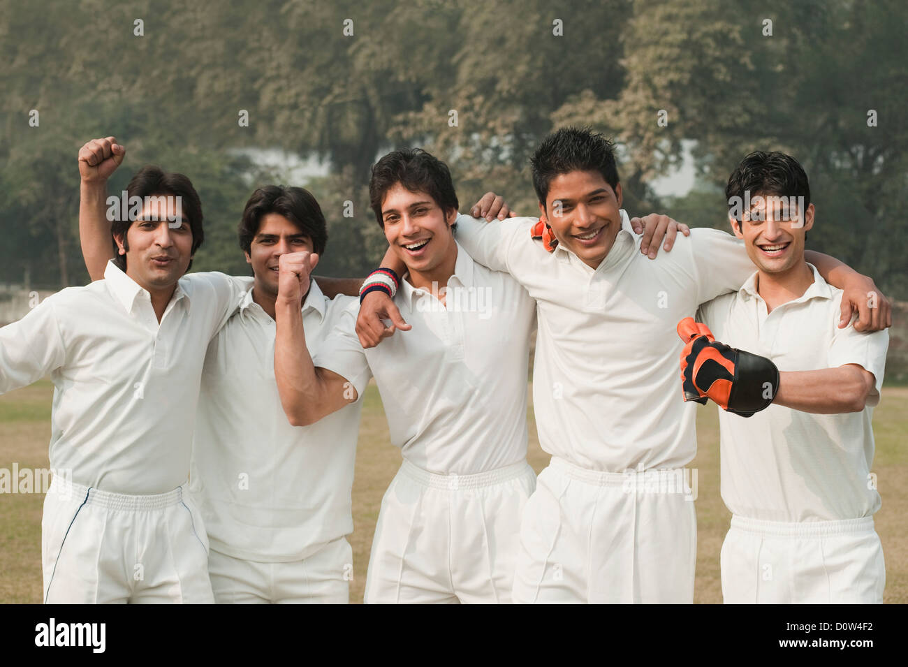 Cricket players celebrating their success Stock Photo
