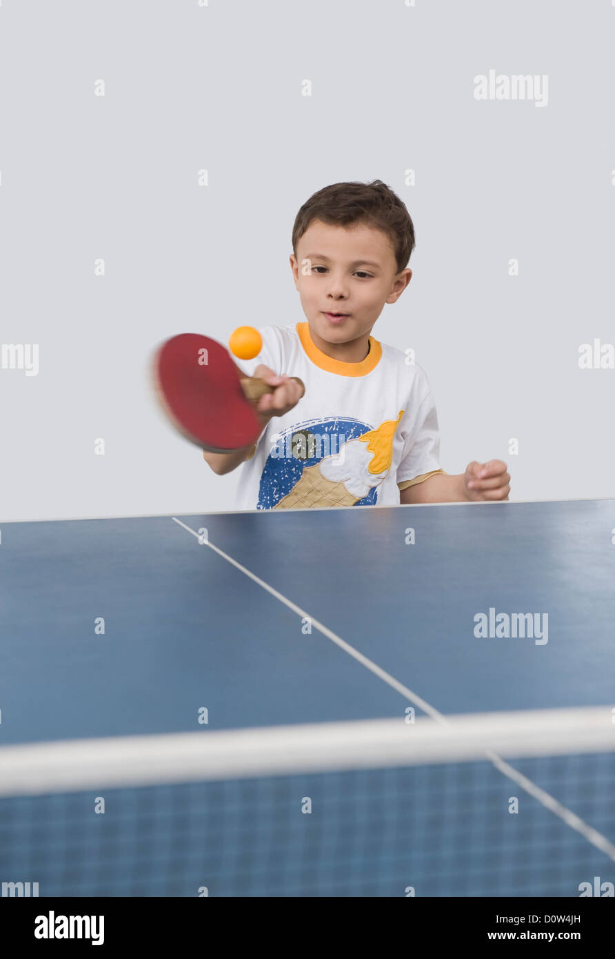 Boy playing table tennis Stock Photo Alamy