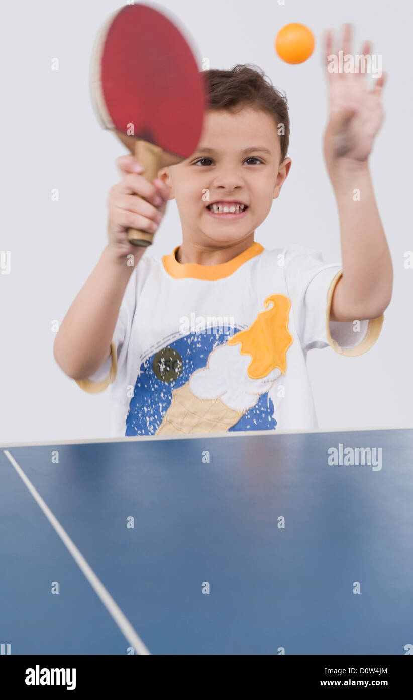 Boy playing table tennis Stock Photo Alamy