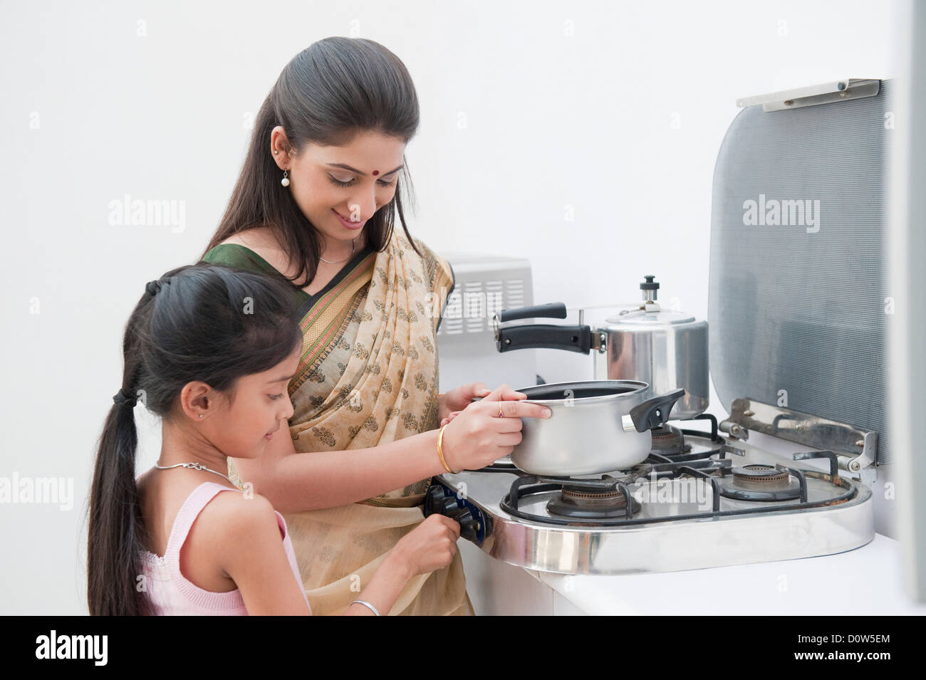Pressure cooker woman hi-res stock photography and images - Page 2 - Alamy