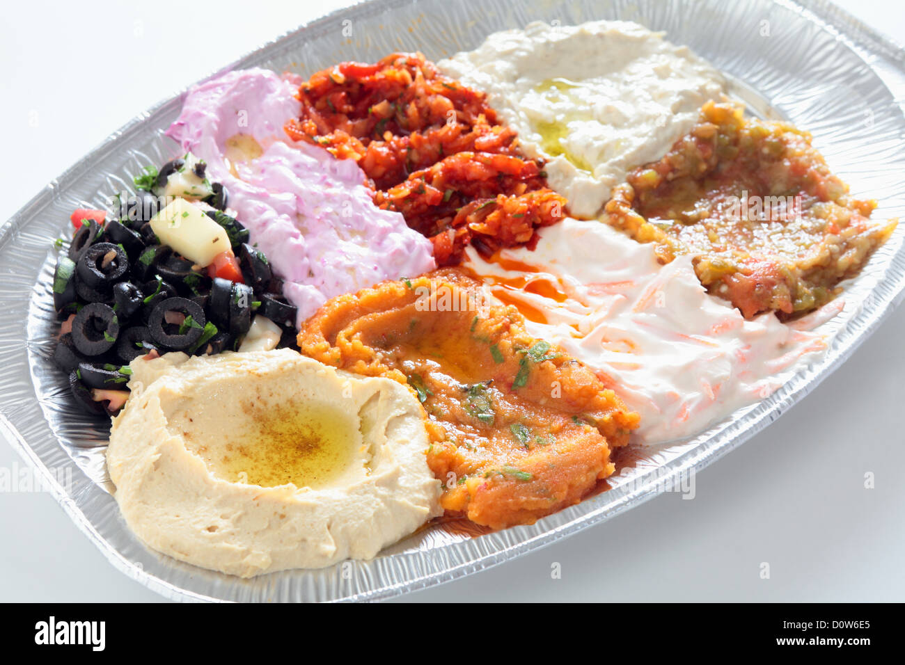 A restaurant take-away plate of Turkish or Arab mezzes, Stock Photo