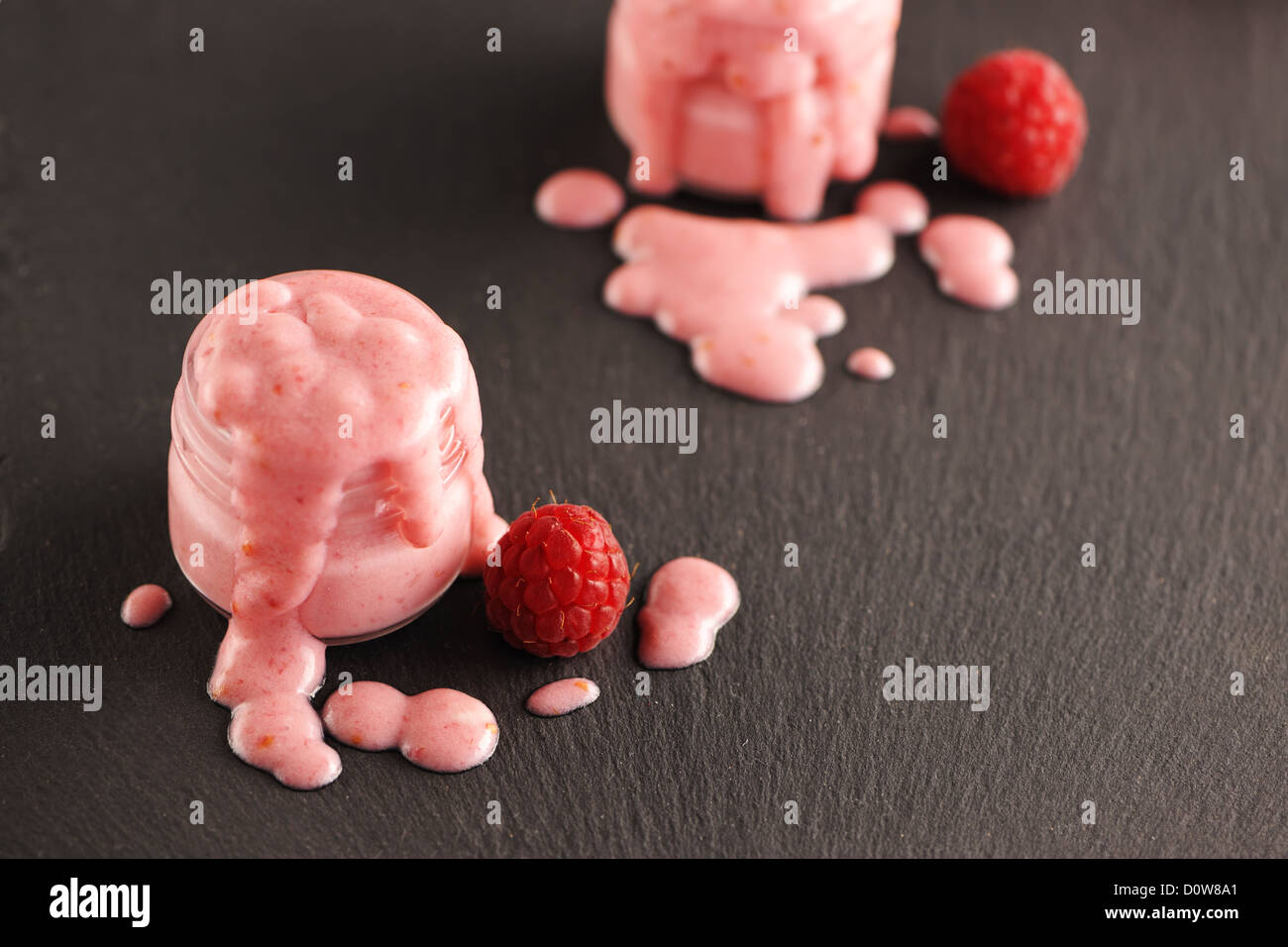 Yoghurt Coated Raspberry Fresh yogurt with raspberry Stock Photo - Alamy