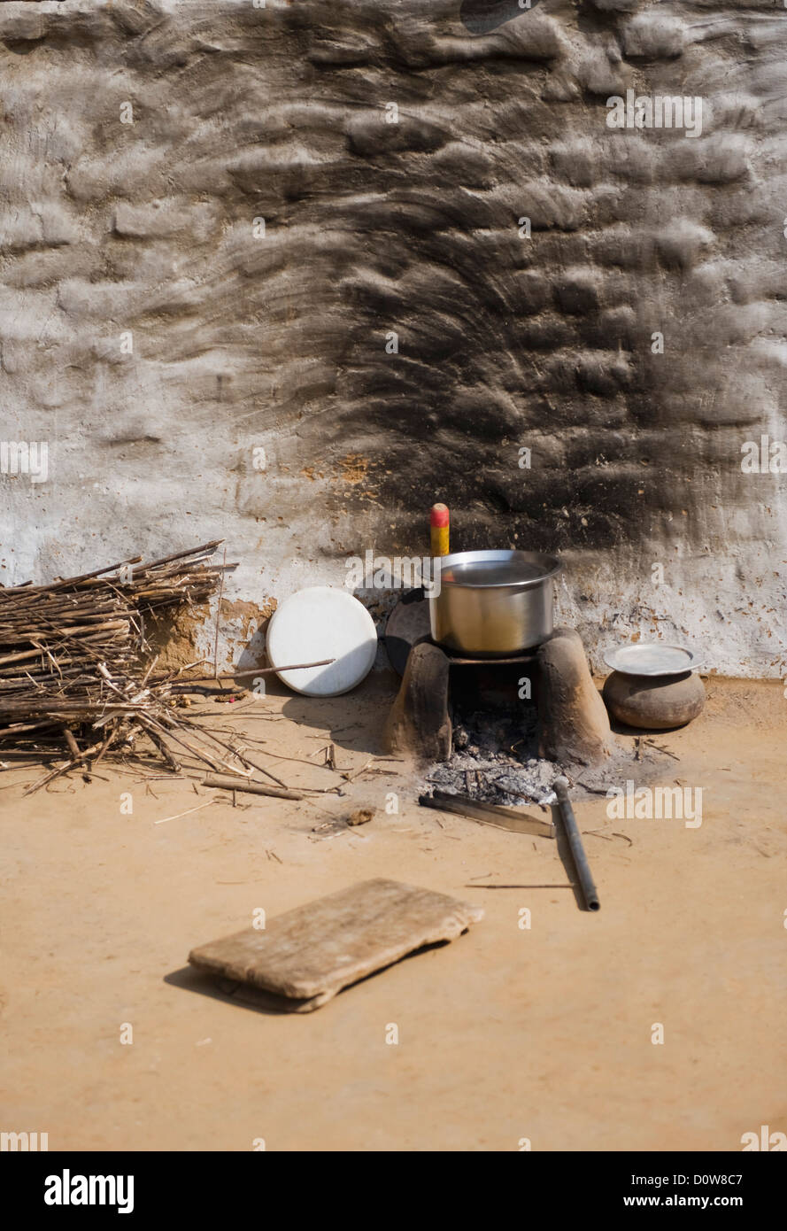 Utensil on a wood burning stove, Farrukh Nagar, Gurgaon, Haryana, India Stock Photo