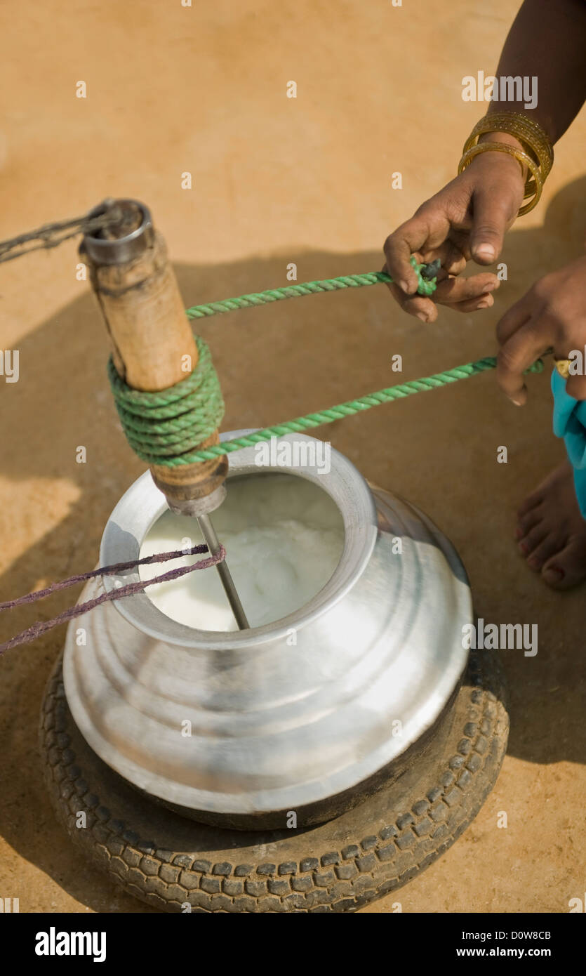 Woman churning butter hires stock photography and images Alamy