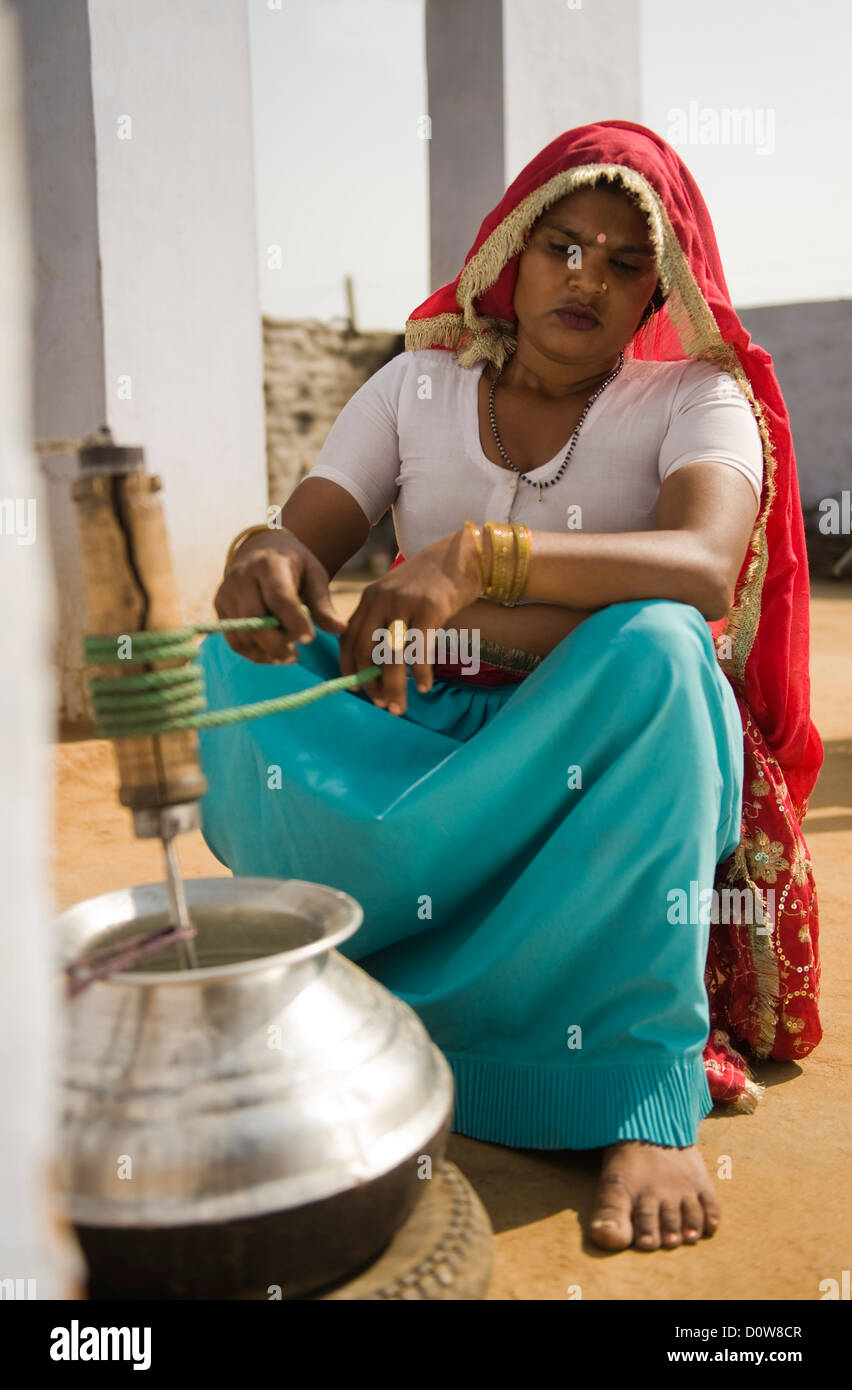 Woman churning butter hires stock photography and images Alamy