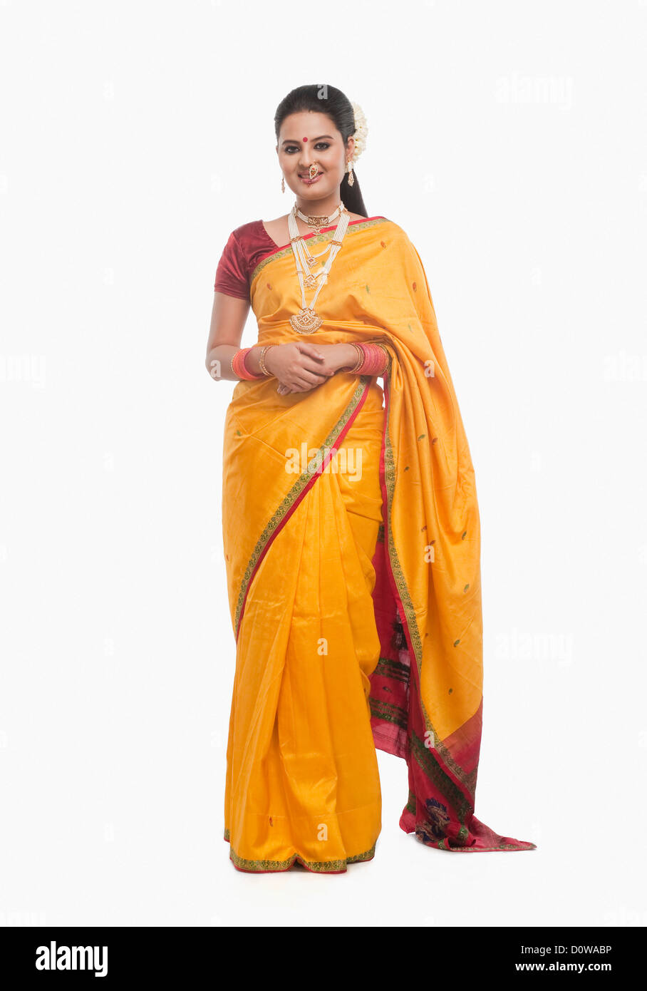 Portrait of a woman smiling in traditional clothing Stock Photo - Alamy
