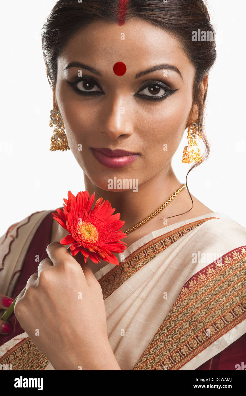 Portrait of a Bengali woman holding a Daisy flower Stock Photo Alamy