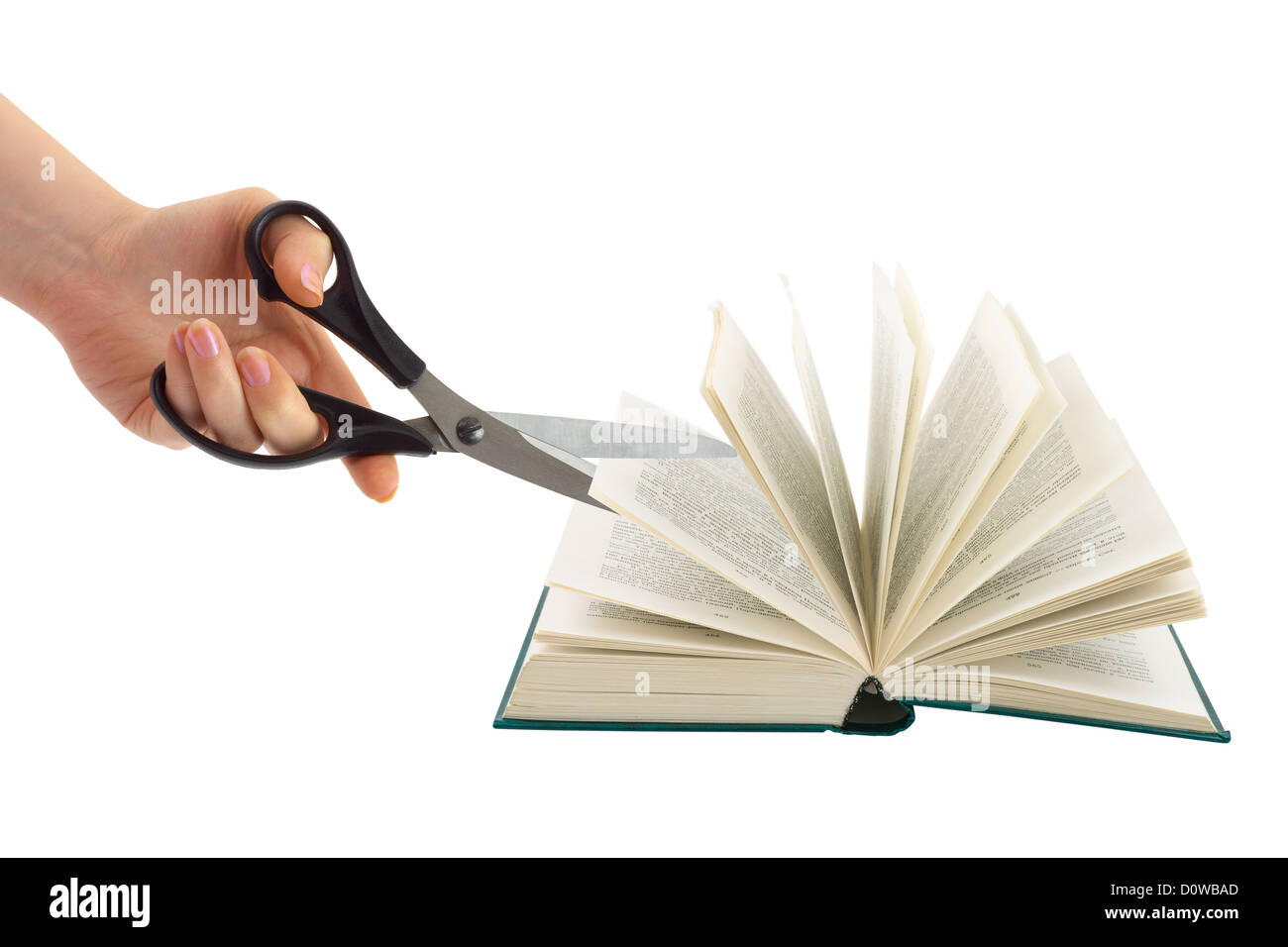 Hand with scissors cutting book Stock Photo Alamy