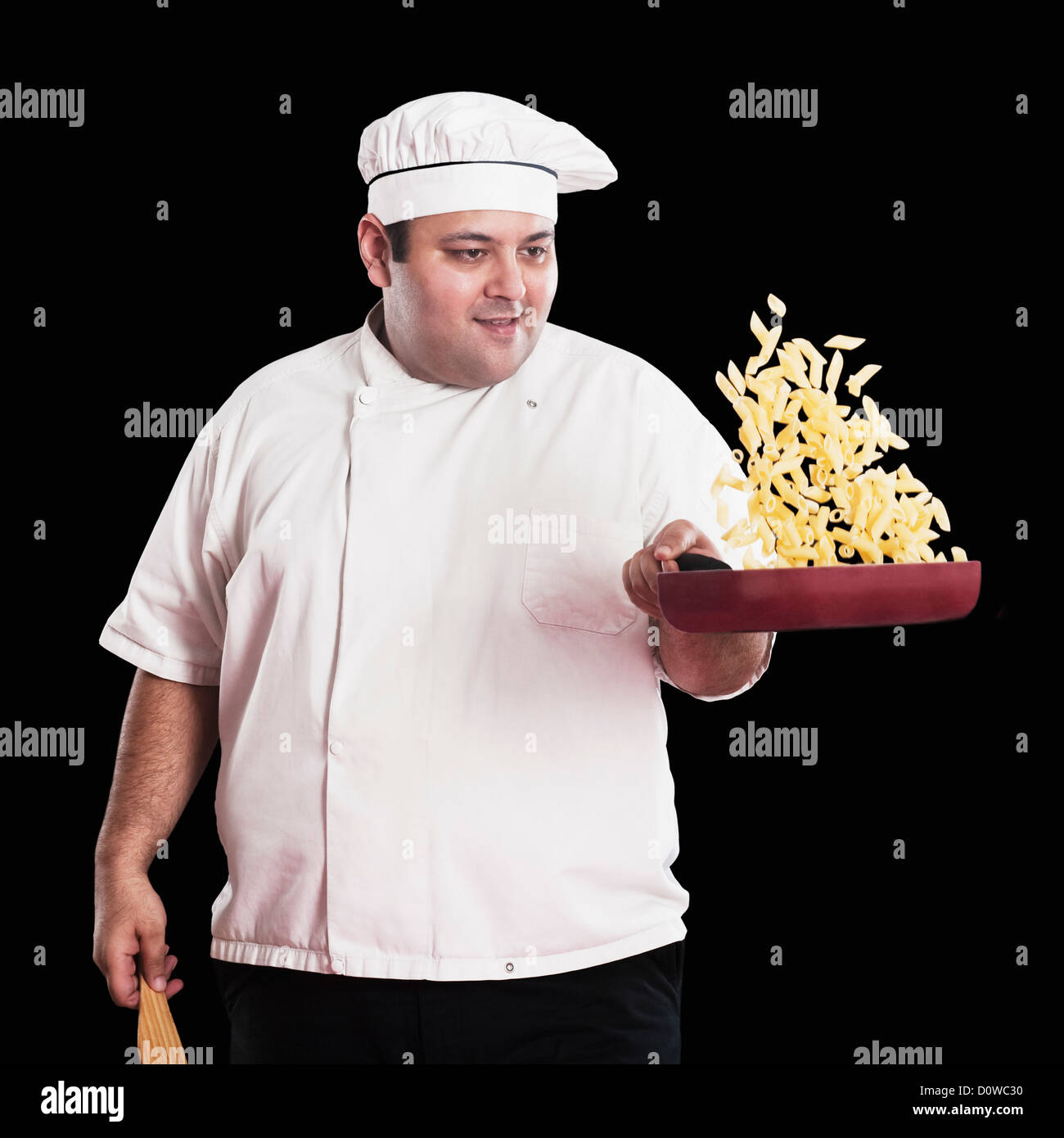 Chef cooking penne pasta Stock Photo - Alamy