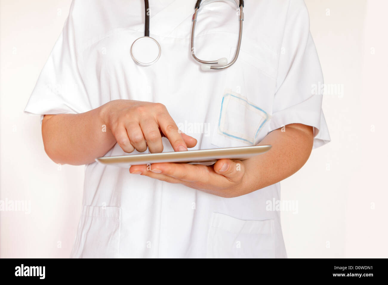 Female doctor using Tablet PC. Stock Photo