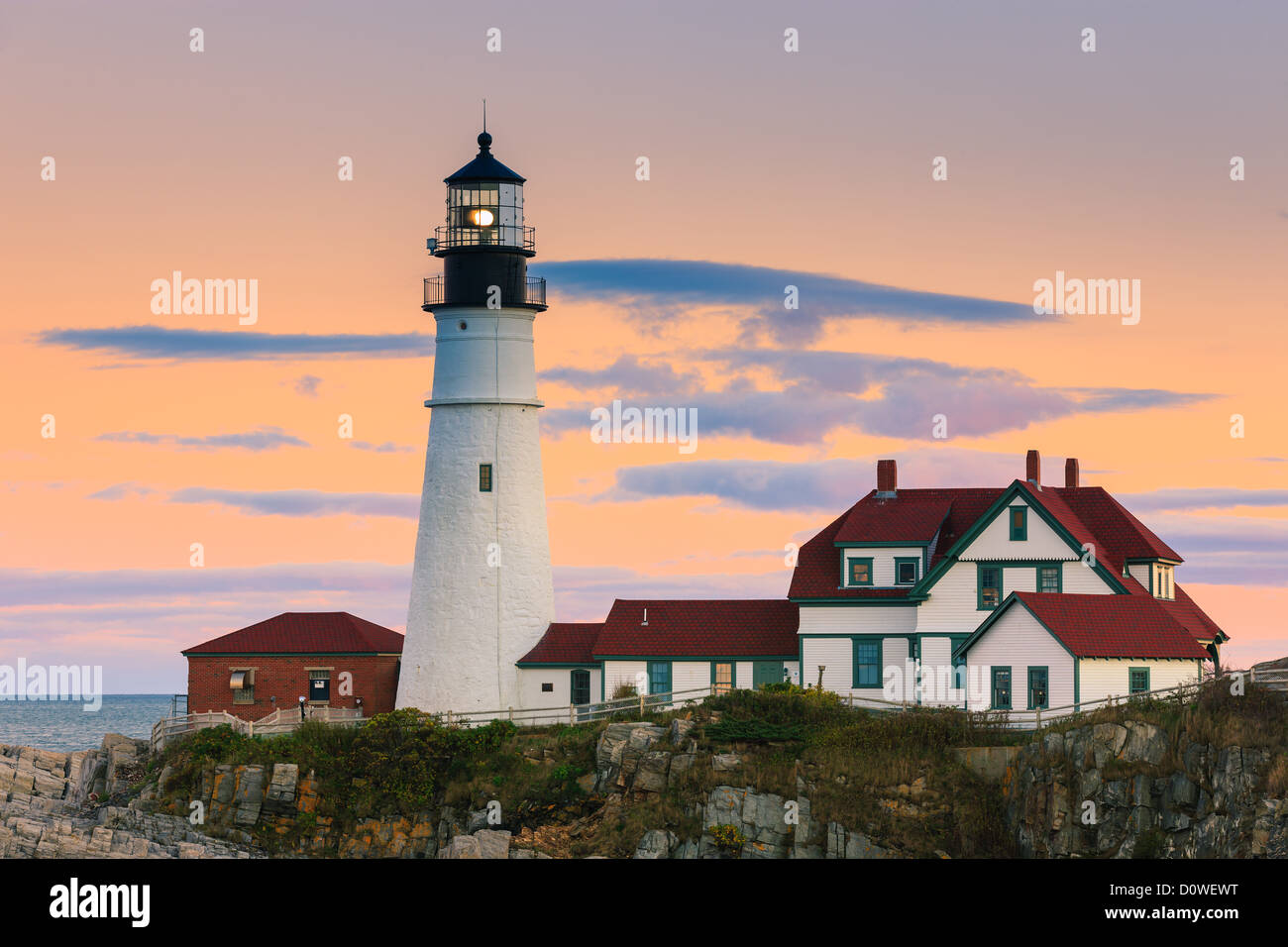 Sunset at Portland Head Light. A historic lighthouse in Cape Elizabeth, Maine Stock Photo