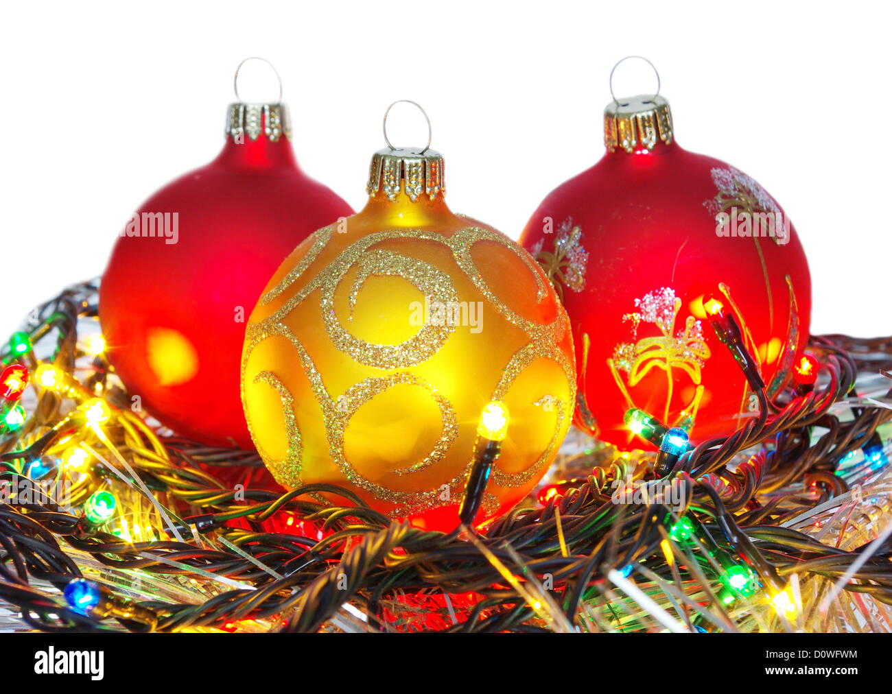 Christmas tinsel and toys on a white background Stock Photo