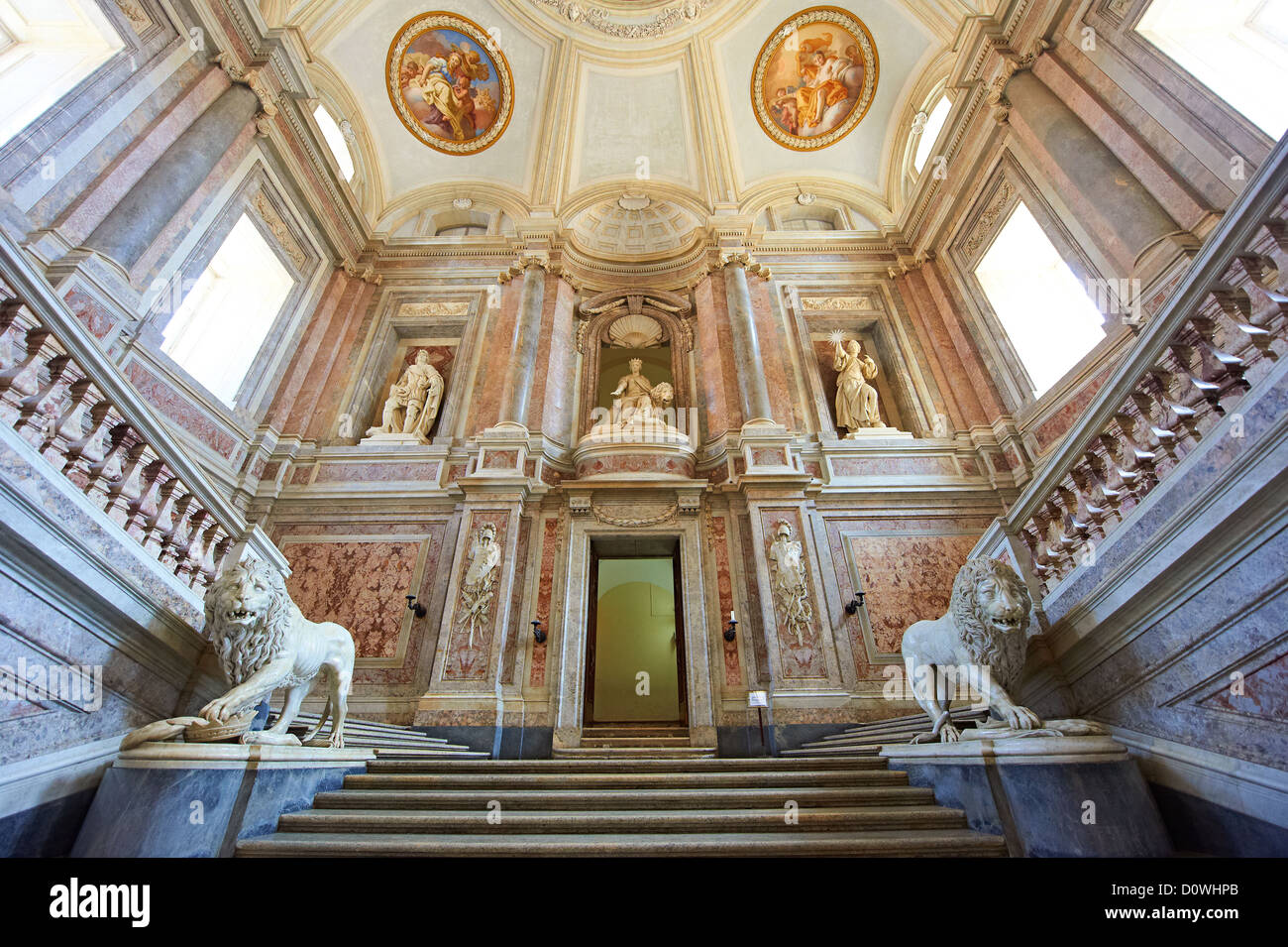 The Baroque Honour Grand Staircase entrance to the Bourbon Kings of Naples Royal Palace of Caserta, Italy.  Stock Photo