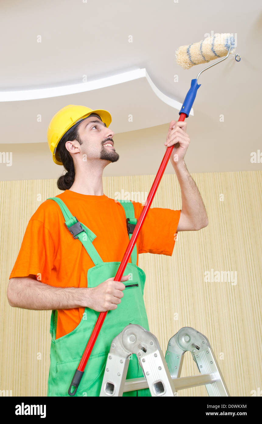 Painter worker during painting job Stock Photo Alamy