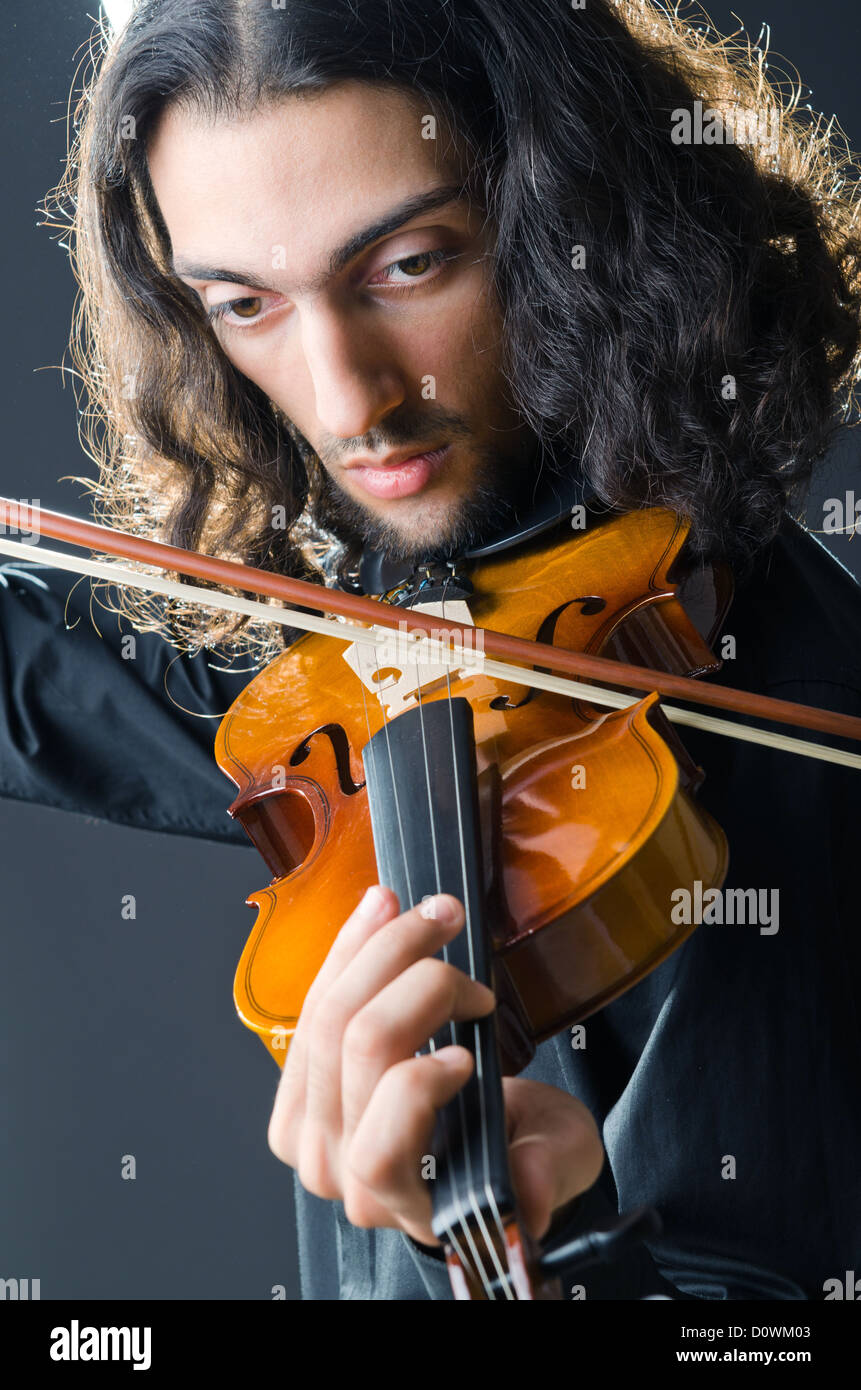 Fiddler playing the violin Stock Photo - Alamy