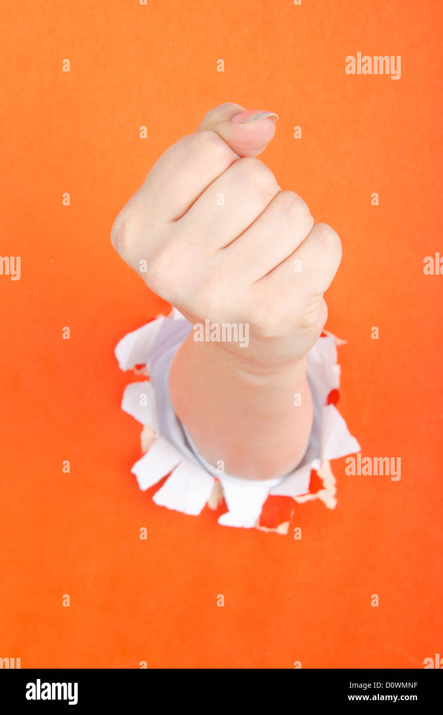 Hand showing fist holding paper hi-res stock photography and images - Alamy