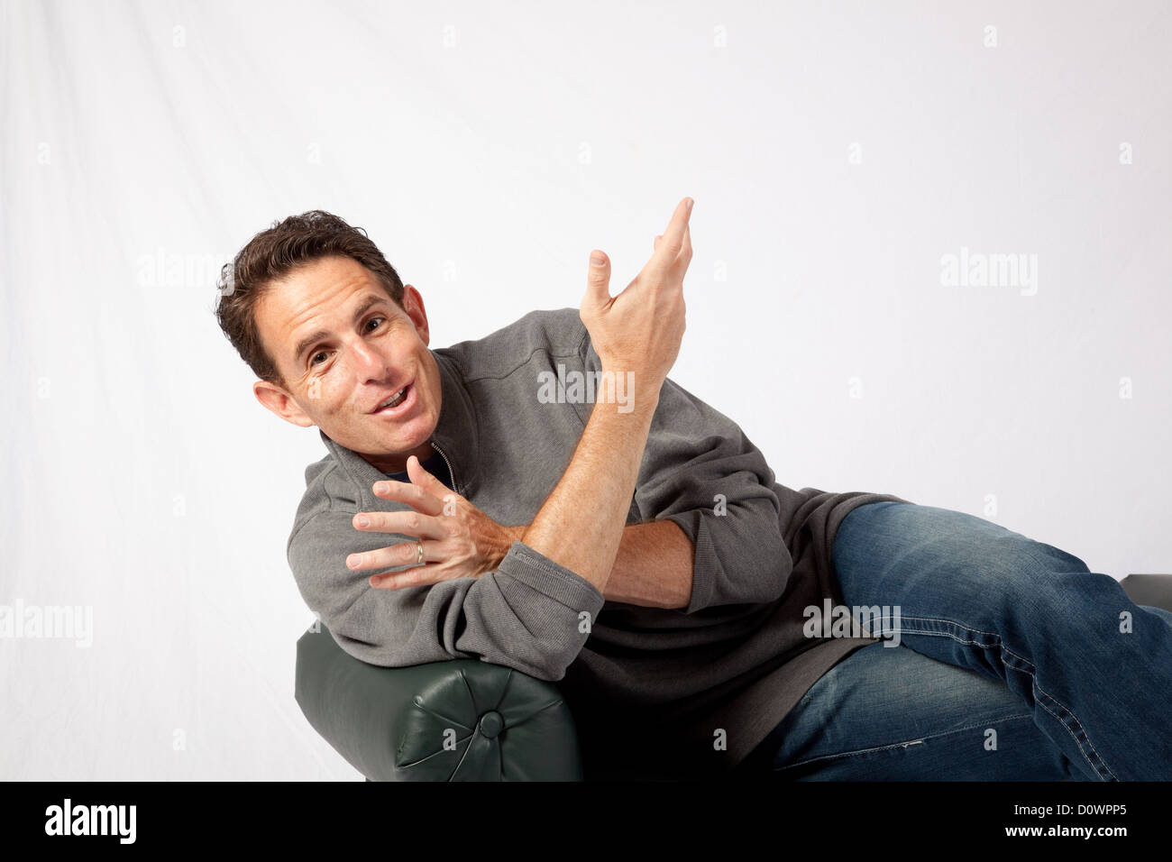 Handsome mature man talking hi-res stock photography and images - Alamy