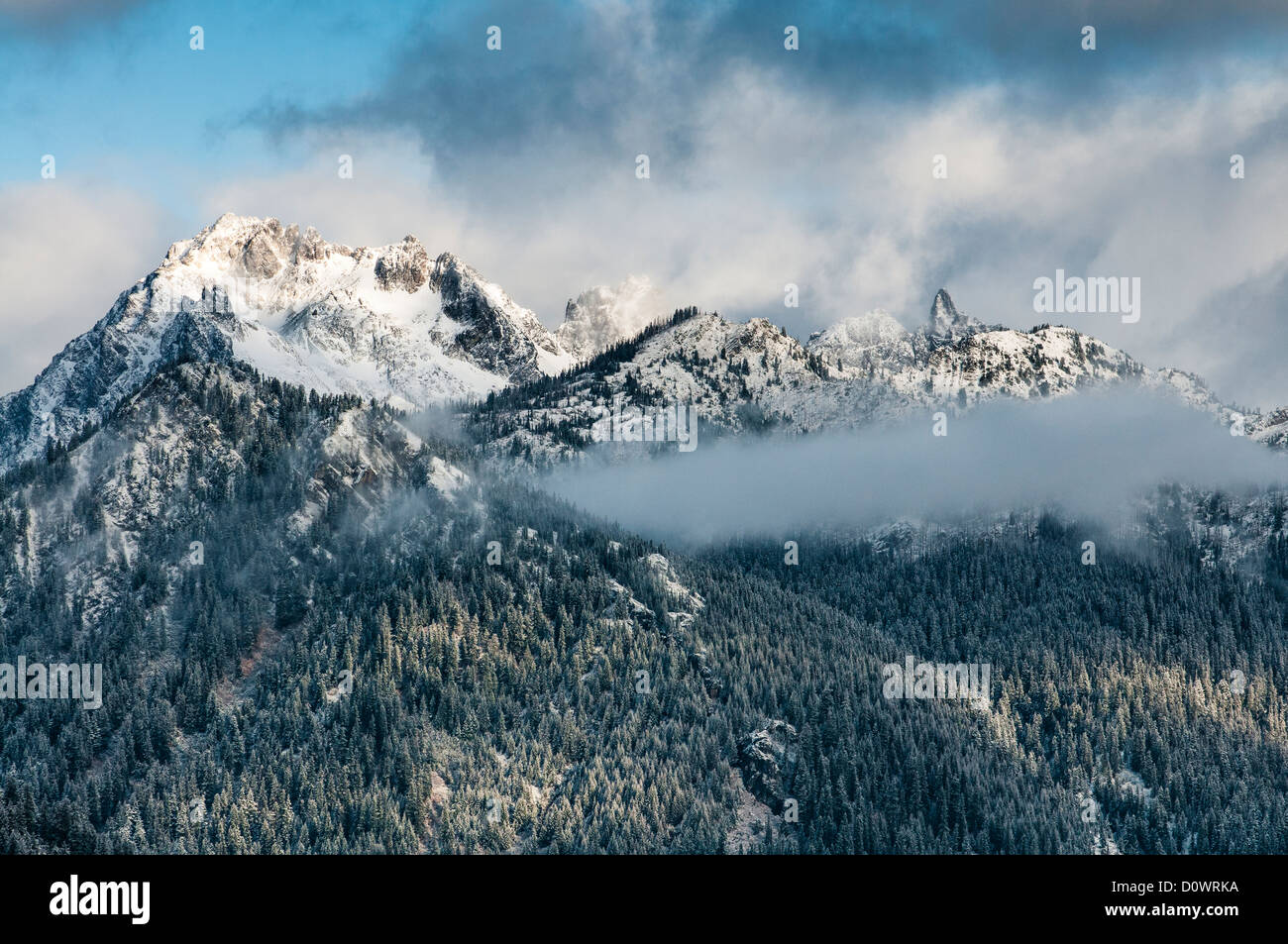 Chikamin Ridge and the Three Queens Peaks above Cooper Lake in the central Cascade Mountains, Washington. Stock Photo