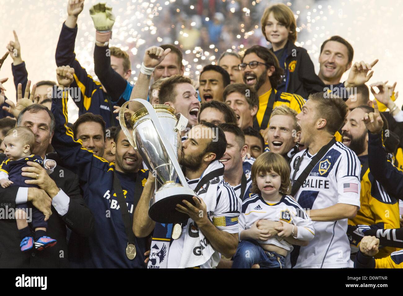 Dec. 1, 2012 - Los Angeles, California (CA, United States - Los Angeles Galaxy Landon Donovan #10 kisses the trophy as he celebrates with teammates after the Galaxy defeat the Houston Dynamo 3-1 to win the 2012 Major League Soccer (MLS) Cup final at the Home Depot Center on December 1, 2012 in Carson, California. (Credit Image: © Ringo Chiu/ZUMAPRESS.com) Stock Photo
