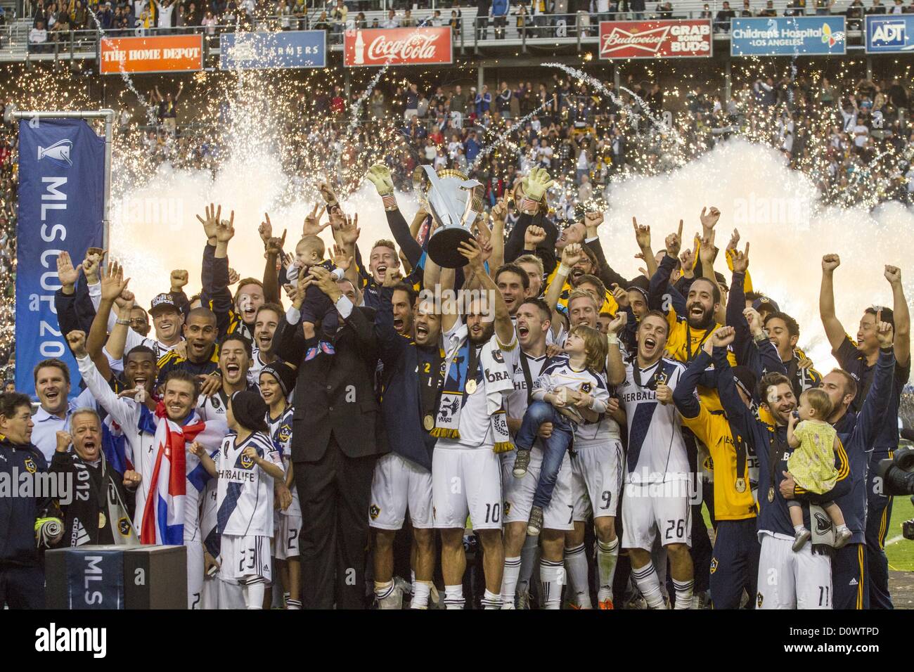 Dec. 1, 2012 - Los Angeles, California (CA, United States - Los Angeles Galaxy star David Beckham #23 with his sons Brooklyn Beckham, Romeo Beckham and Cruz Bekham, celebrates with his teammates after the Galaxy defeat the Houston Dynamo 3-1 to win the 2012 Major League Soccer (MLS) Cup final at the Home Depot Center on December 1, 2012 in Carson, California. Beckham will be leaving the team after the game. He joined the L.A. Galaxy back on January 11, 2007, when he signed a 5-year contract worth $32.5ÃŠmillion. He has played in over 98 games during his six season stint with the Galaxy and jus Stock Photo