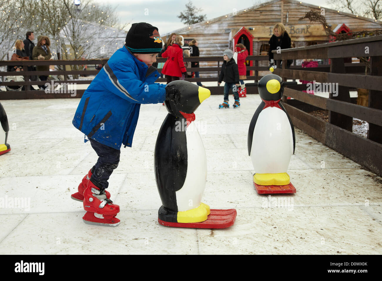 Skating on the outdoor ice rink, in the Elf village. Lapland UK, Bewl